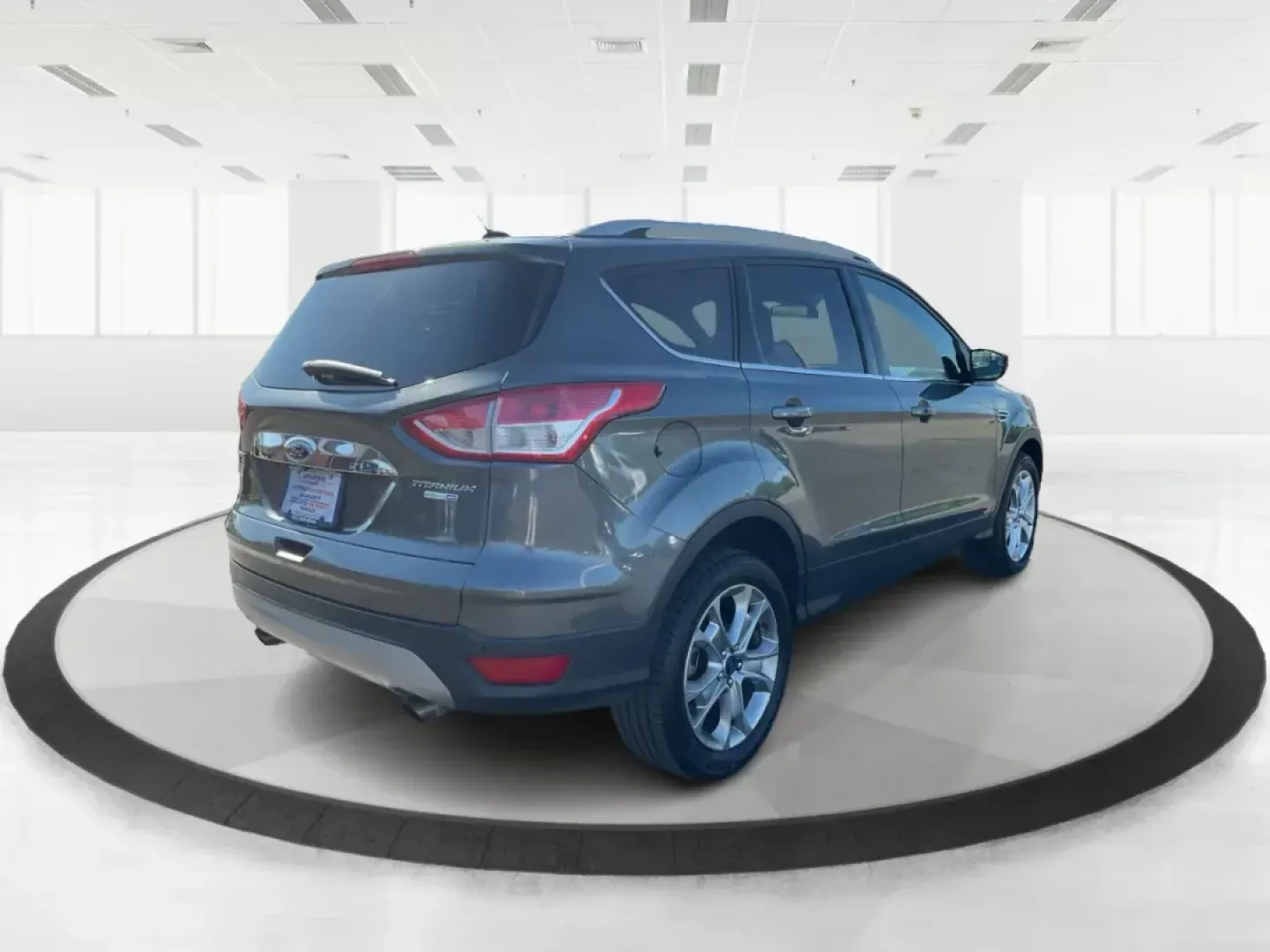 2016 Ford Escape Titanium (1FMCU9J92GU) with an EcoBoost 1.6L I-4 gasoline direct injection engine, located at 1184 Kauffman Ave, Fairborn, OH, 45324, (937) 908-9800, 39.807072, -84.030914 - 2016 Ford Escape Titanium - Photo#1