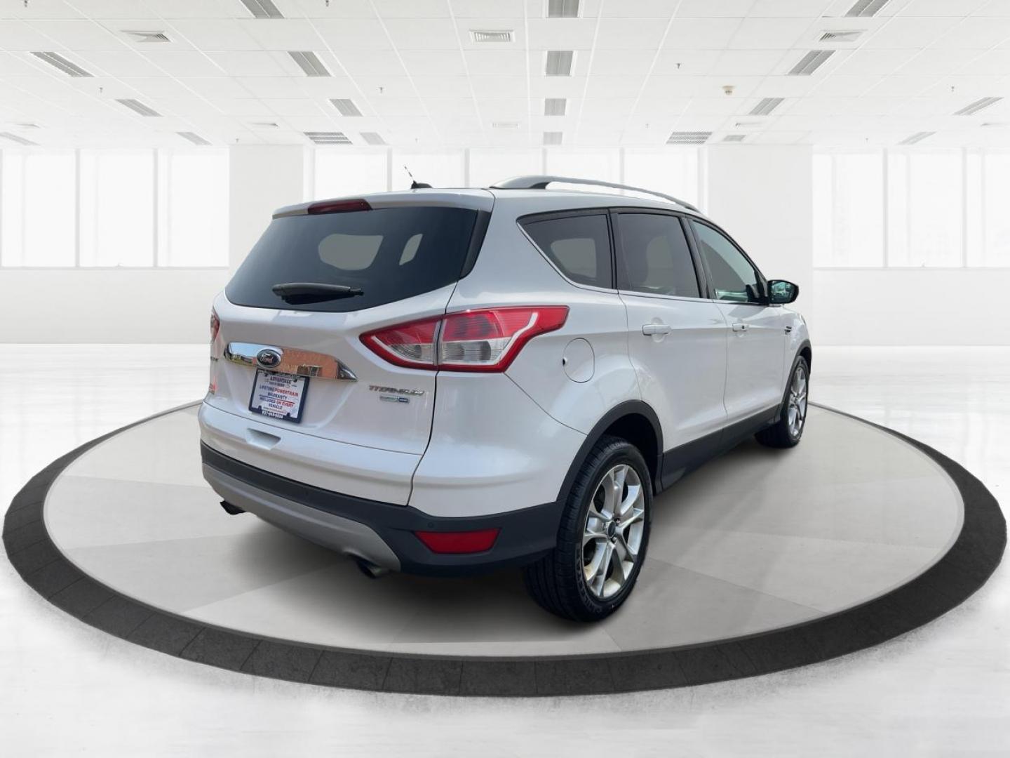 2016 Ford Escape Titanium (1FMCU9J98GU) with an Other engine, located at 1230 East Main St, Xenia, OH, 45385, (937) 908-9800, 39.688026, -83.910172 - 2016 Ford Escape Titanium - Photo#2