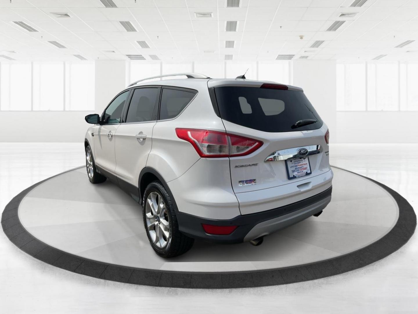 2016 Ford Escape Titanium (1FMCU9J98GU) with an Other engine, located at 1230 East Main St, Xenia, OH, 45385, (937) 908-9800, 39.688026, -83.910172 - 2016 Ford Escape Titanium - Photo#4
