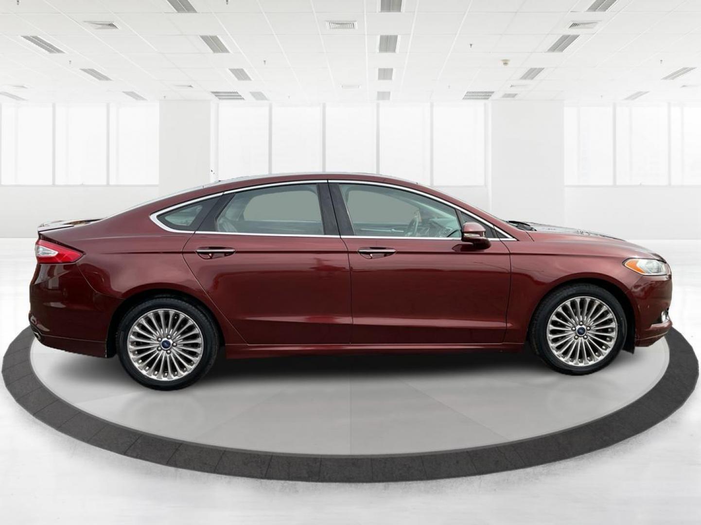 2016 Ford Fusion Titanium (3FA6P0K92GR) with an EcoBoost 2L I-4 gasoline direct injection engine, located at 4508 South Dixie Dr, Moraine, OH, 45439, (937) 908-9800, 39.689976, -84.218452 - 2016 Ford Fusion Titanium - Photo#1