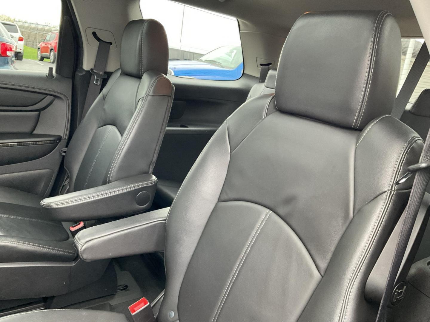 2016 GMC Acadia SLT (1GKKVRKD0GJ) with an 3.6L V-6 gasoline direct injection engine, located at 8750 N County Rd 25A, Piqua, OH, 45356, (937) 908-9800, 40.164391, -84.232513 - Third Row - Photo#9