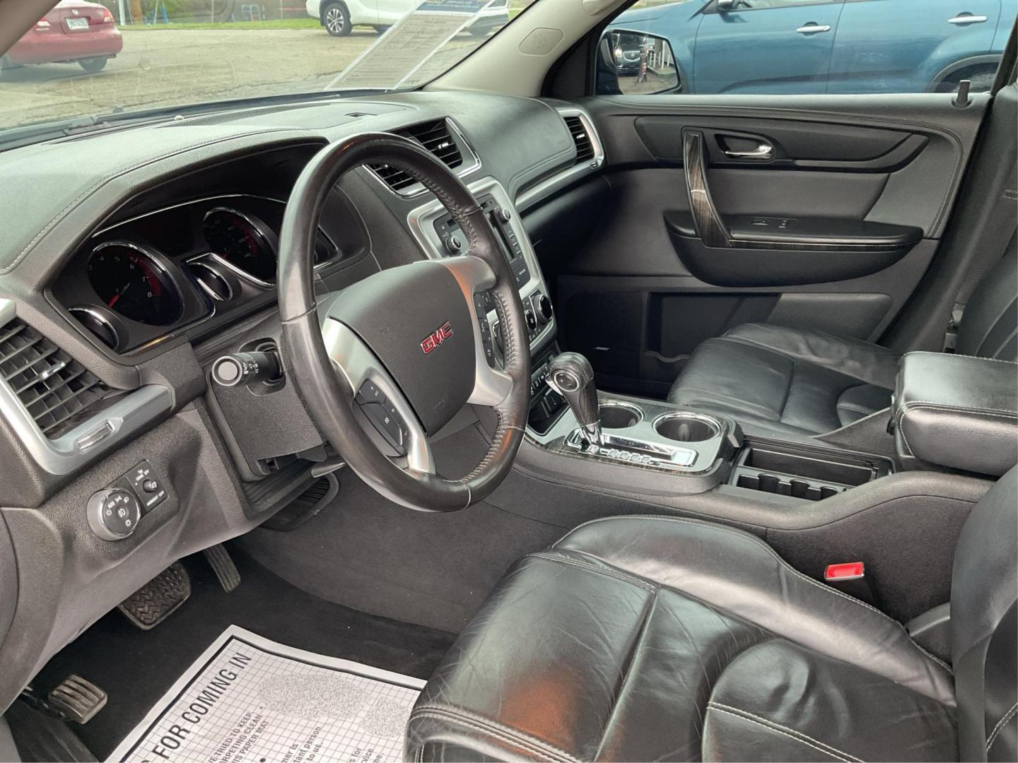 2016 GMC Acadia SLT (1GKKVRKD0GJ) with an 3.6L V-6 gasoline direct injection engine, located at 8750 N County Rd 25A, Piqua, OH, 45356, (937) 908-9800, 40.164391, -84.232513 - Third Row - Photo#8