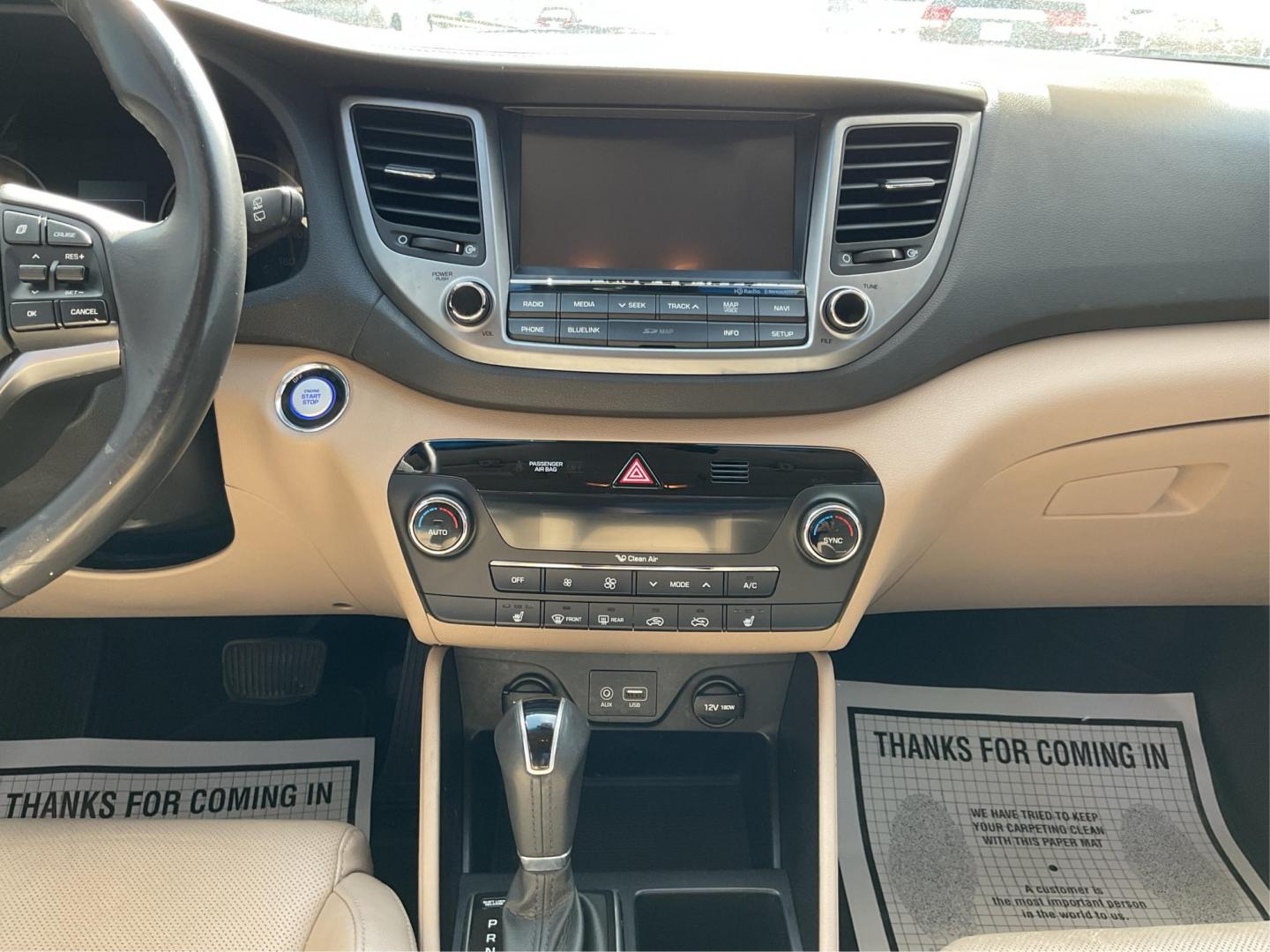 2016 Hyundai Tucson Limited (KM8J3CA20GU) with an 1.6L I-4 gasoline direct injection engine, located at 1099 N County Rd 25A , Troy, OH, 45373, (937) 908-9800, 40.057079, -84.212883 - 2016 Hyundai Tucson Limited - Photo#12