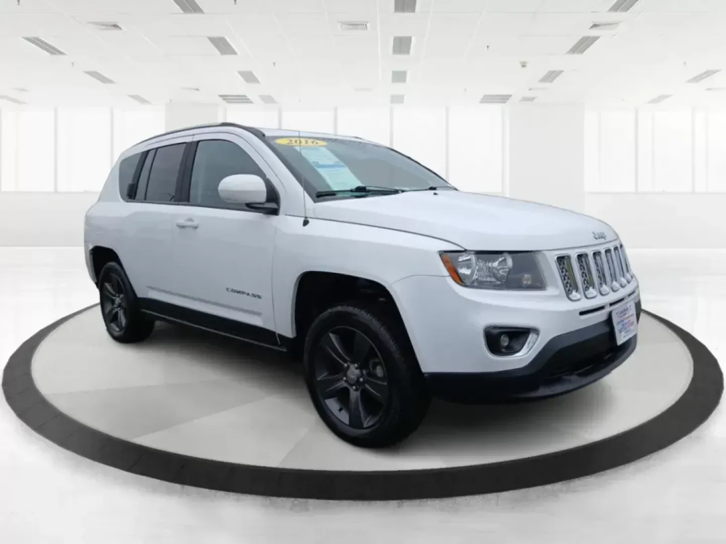 2016 Jeep Compass Latitude FWD (1C4NJCEA3GD) with an 2.0L L4 DOHC 16V engine, Continuously Variable Transmission transmission, located at 880 E. National Road, Vandalia, OH, 45377, (937) 908-9800, 39.891918, -84.183594 - 2016 Jeep Compass Latitude FWD - Photo#0