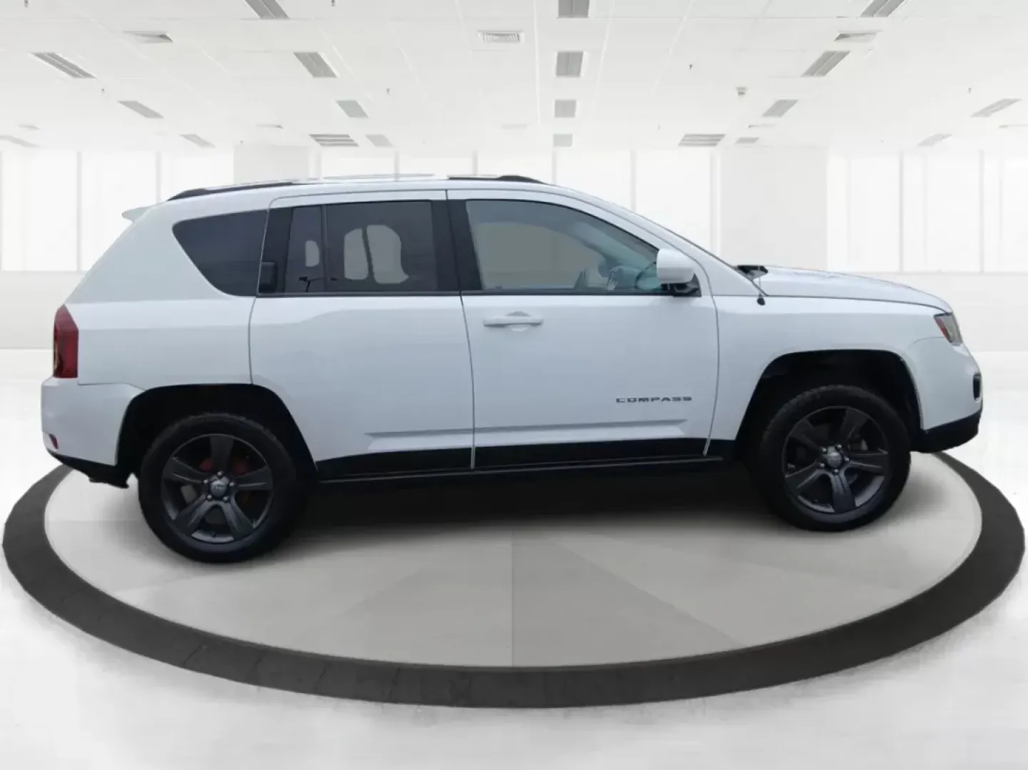 2016 Jeep Compass Latitude FWD (1C4NJCEA3GD) with an 2.0L L4 DOHC 16V engine, Continuously Variable Transmission transmission, located at 880 E. National Road, Vandalia, OH, 45377, (937) 908-9800, 39.891918, -84.183594 - 2016 Jeep Compass Latitude FWD - Photo#1