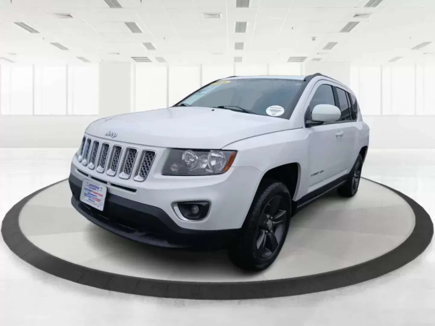 2016 Jeep Compass Latitude FWD (1C4NJCEA3GD) with an 2.0L L4 DOHC 16V engine, Continuously Variable Transmission transmission, located at 880 E. National Road, Vandalia, OH, 45377, (937) 908-9800, 39.891918, -84.183594 - 2016 Jeep Compass Latitude FWD - Photo#8