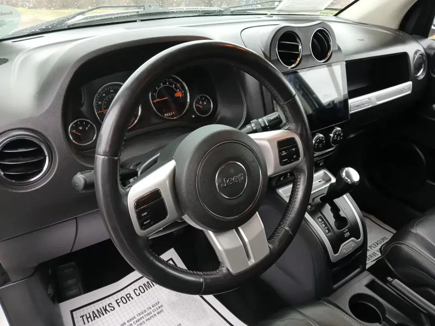 2016 Jeep Compass Latitude FWD (1C4NJCEA3GD) with an 2.0L L4 DOHC 16V engine, Continuously Variable Transmission transmission, located at 880 E. National Road, Vandalia, OH, 45377, (937) 908-9800, 39.891918, -84.183594 - 2016 Jeep Compass Latitude FWD - Photo#9