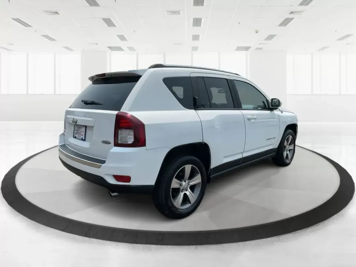 2016 Jeep Compass High Altitude Edition (1C4NJDEB9GD) with an 2.4L I-4 DOHC engine, located at 1230 East Main St, Xenia, OH, 45385, (937) 908-9800, 39.688026, -83.910172 - 2016 Jeep Compass High Altitude Edition - Photo#2