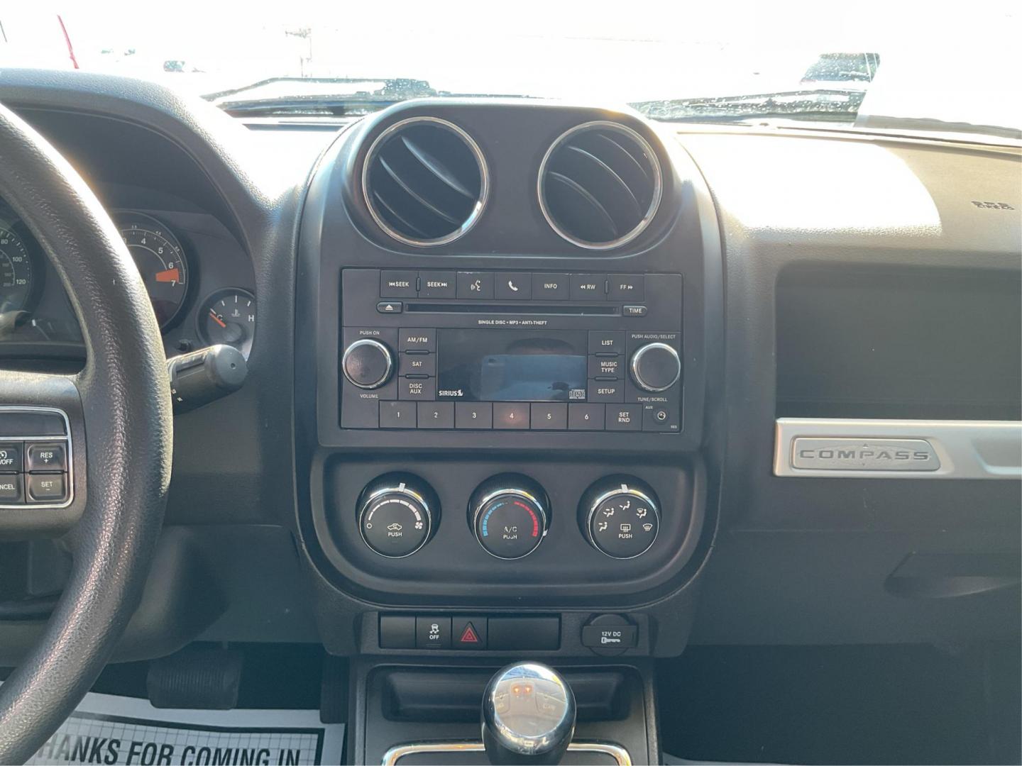 2016 Jeep Compass Sport (1C4NJDBB2GD) with an 2.4L I-4 DOHC engine, located at 1184 Kauffman Ave, Fairborn, OH, 45324, (937) 908-9800, 39.807072, -84.030914 - 2016 Jeep Compass Sport - Photo#10