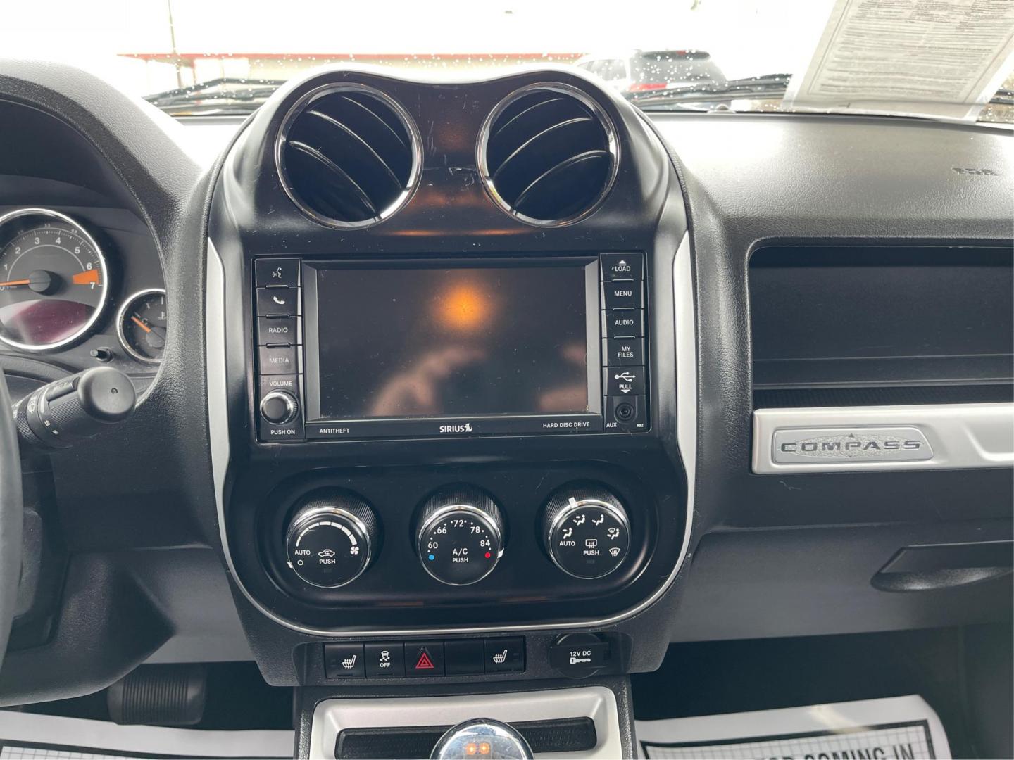 2016 Jeep Compass High Altitude (1C4NJCEA4GD) with an Other engine, located at 4508 South Dixie Dr, Moraine, OH, 45439, (937) 908-9800, 39.689976, -84.218452 - 2016 Jeep Compass High Altitude - Photo#11