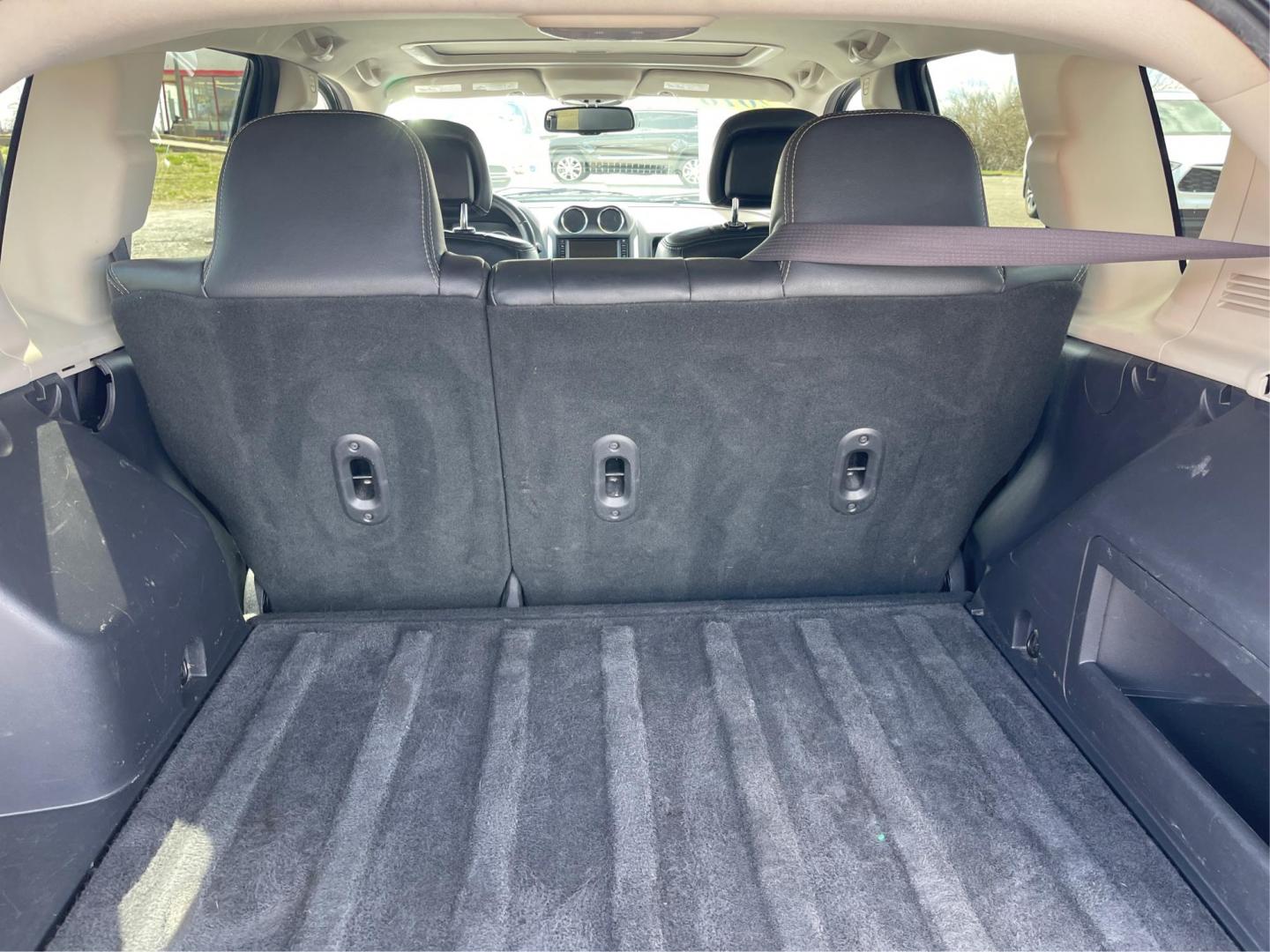 2016 Jeep Compass High Altitude Edition (1C4NJCEA4GD) with an 2L I-4 DOHC engine, located at 401 Woodman Dr, Riverside, OH, 45431, (937) 908-9800, 39.760899, -84.123421 - 2016 Jeep Compass High Altitude Edition - Photo#10