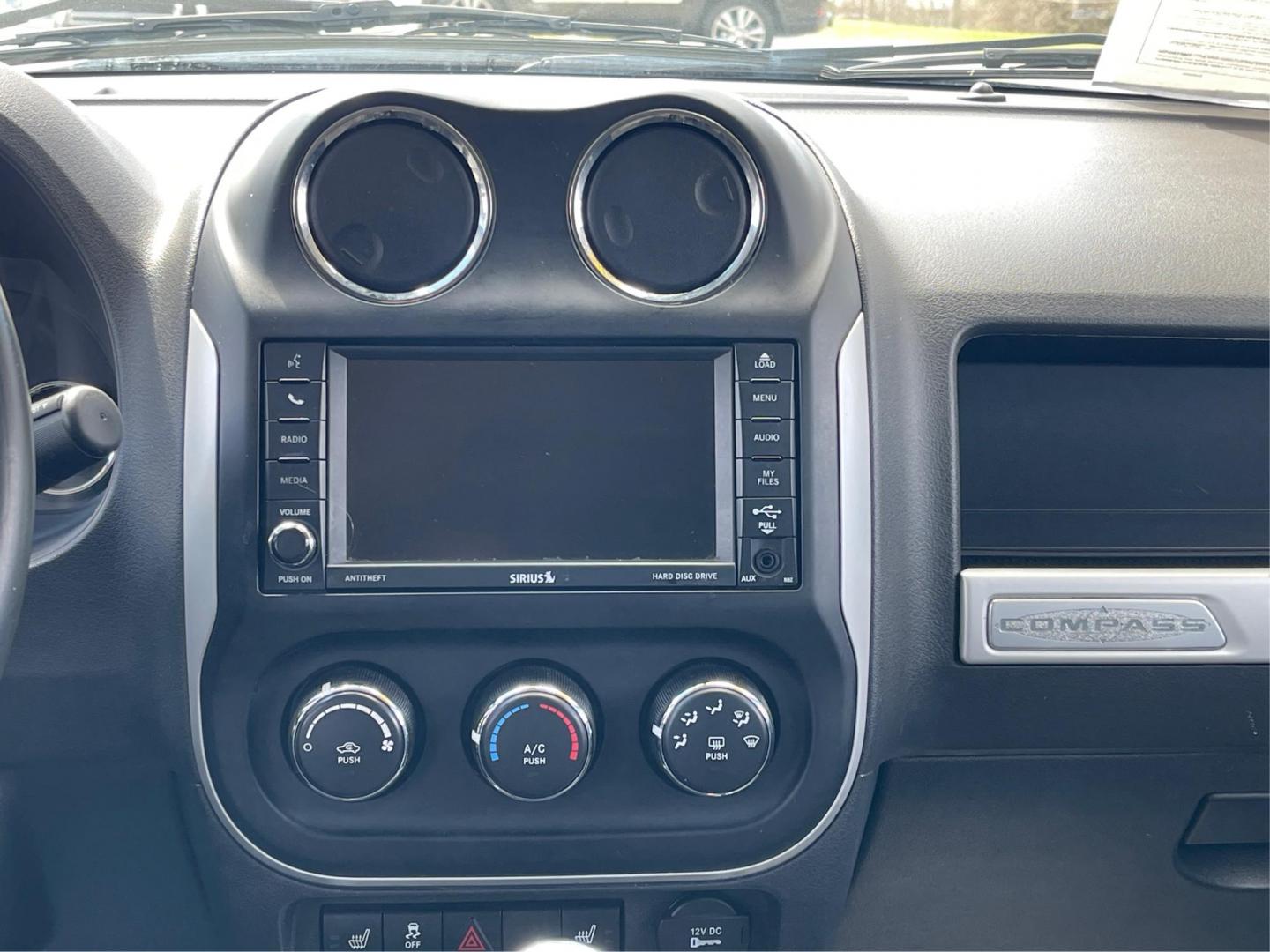 2016 Jeep Compass High Altitude Edition (1C4NJCEA4GD) with an 2L I-4 DOHC engine, located at 401 Woodman Dr, Riverside, OH, 45431, (937) 908-9800, 39.760899, -84.123421 - 2016 Jeep Compass High Altitude Edition - Photo#11