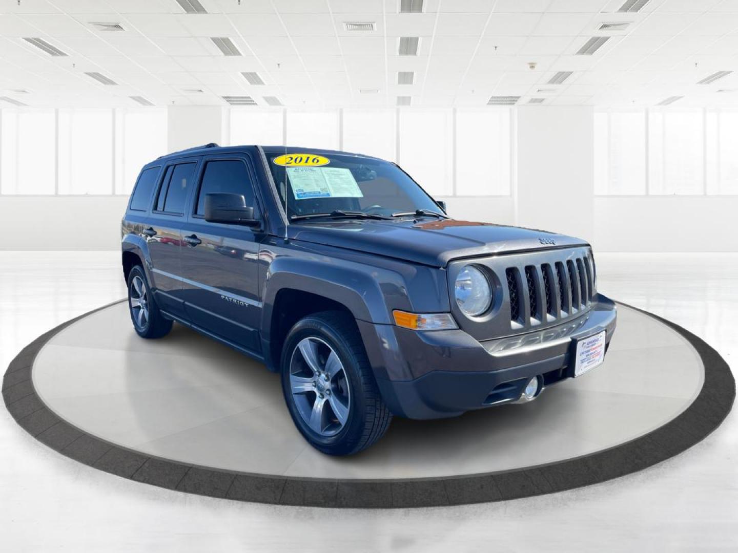 2016 Jeep Patriot High Altitude Edition (1C4NJPFAXGD) with an 2L I-4 DOHC engine, located at 8750 N County Rd 25A, Piqua, OH, 45356, (937) 908-9800, 40.164391, -84.232513 - 2016 Jeep Patriot High Altitude Edition - Photo#0
