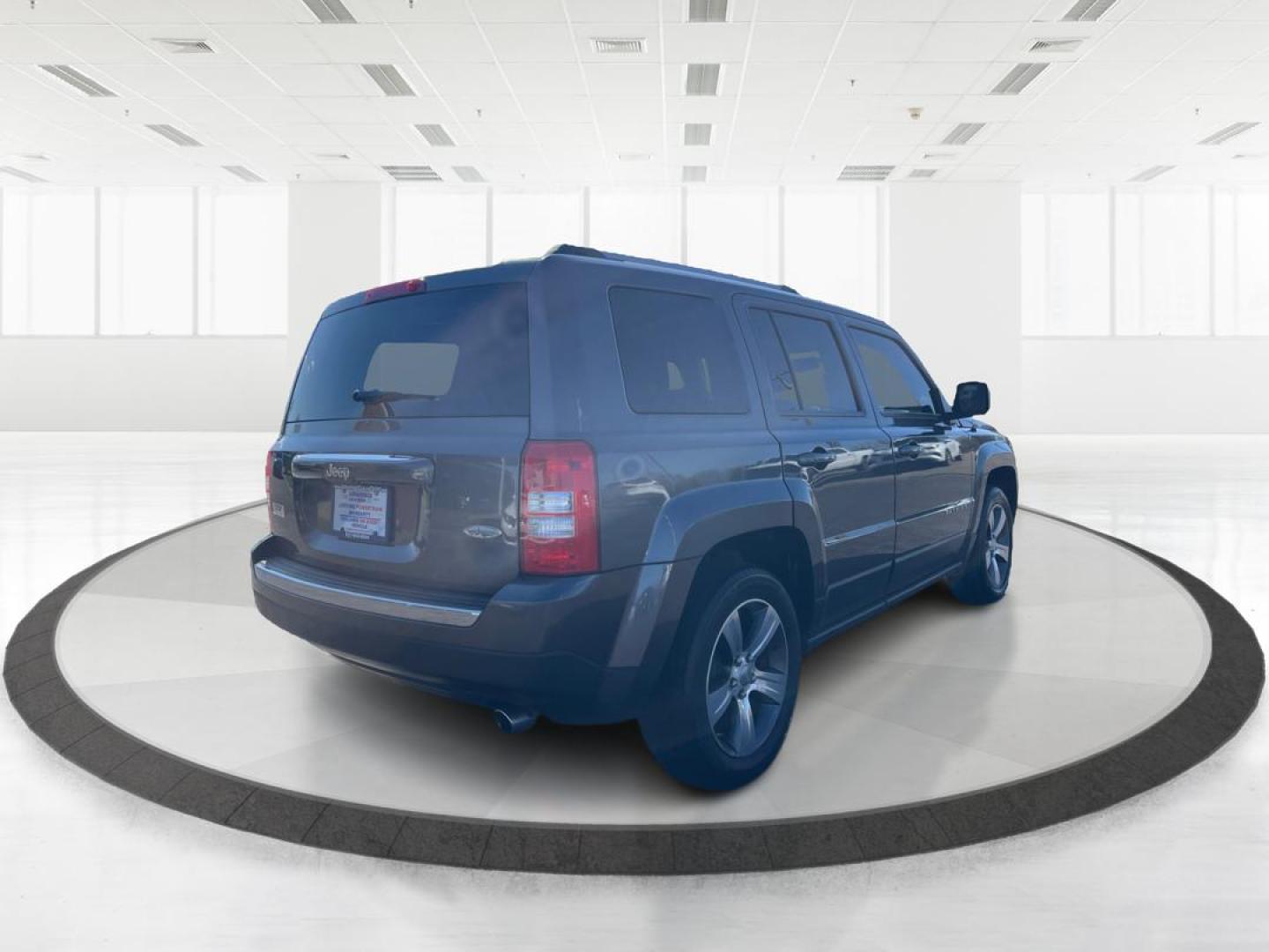 2016 Jeep Patriot High Altitude Edition (1C4NJPFAXGD) with an 2L I-4 DOHC engine, located at 8750 N County Rd 25A, Piqua, OH, 45356, (937) 908-9800, 40.164391, -84.232513 - 2016 Jeep Patriot High Altitude Edition - Photo#2