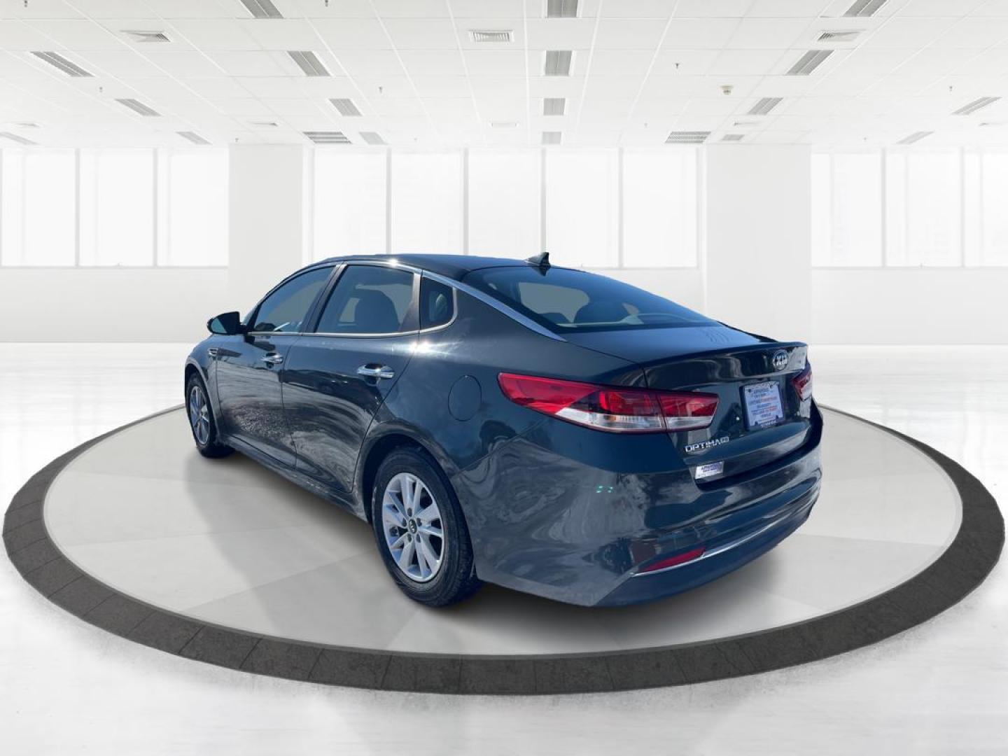 2016 Kia Optima LX (KNAGT4L3XG5) with an 2.4L L4 DOHC 16V engine, 6-Speed Automatic transmission, located at 1099 N County Rd 25A , Troy, OH, 45373, (937) 908-9800, 40.057079, -84.212883 - 2016 Kia Optima LX - Photo#4