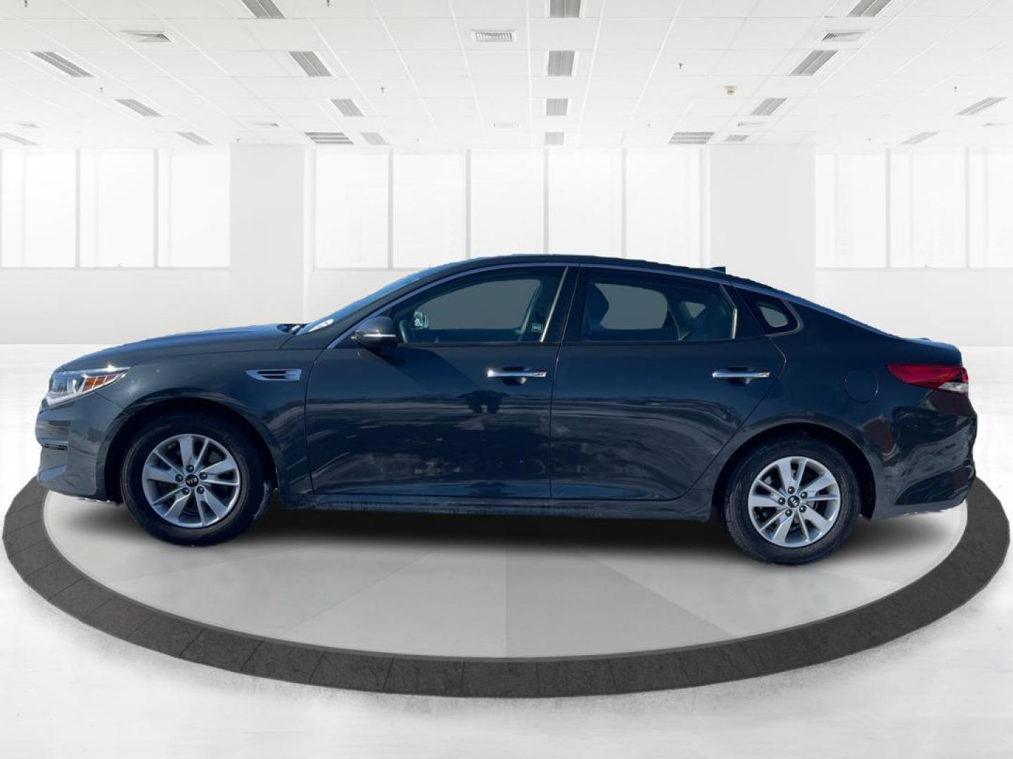 2016 Kia Optima LX (KNAGT4L3XG5) with an 2.4L L4 DOHC 16V engine, 6-Speed Automatic transmission, located at 1099 N County Rd 25A , Troy, OH, 45373, (937) 908-9800, 40.057079, -84.212883 - 2016 Kia Optima LX - Photo#5