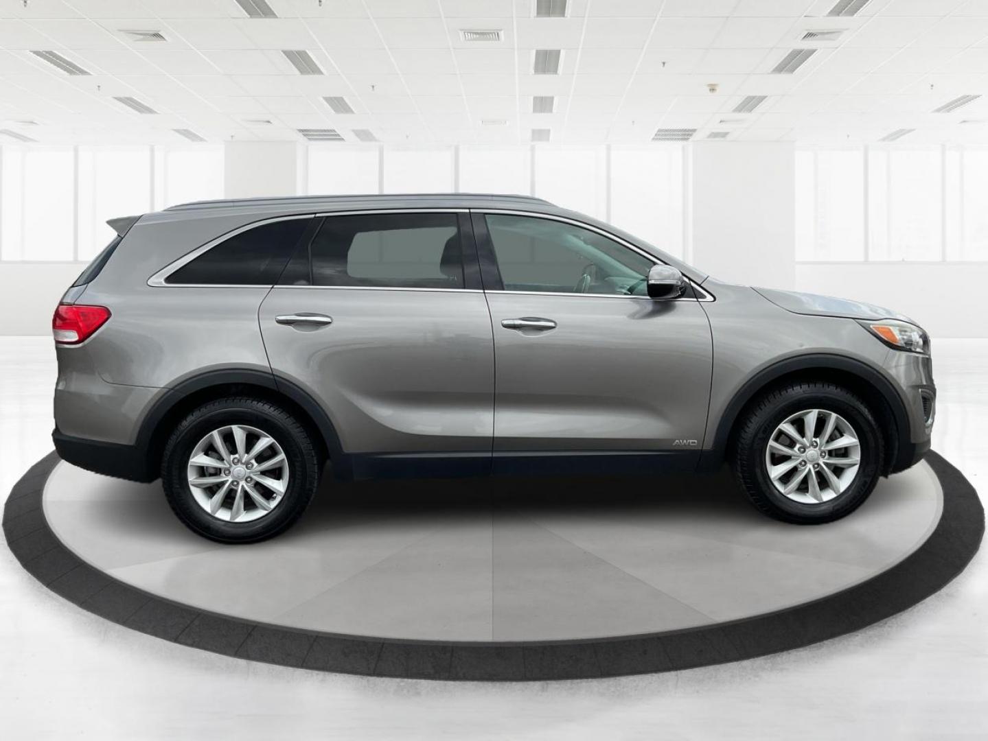 2016 Kia Sorento 2.4L LX (5XYPGDA32GG) with an 2.4L I-4 gasoline direct injection engine, located at 1184 Kauffman Ave, Fairborn, OH, 45324, (937) 908-9800, 39.807072, -84.030914 - Third Row - Photo#1