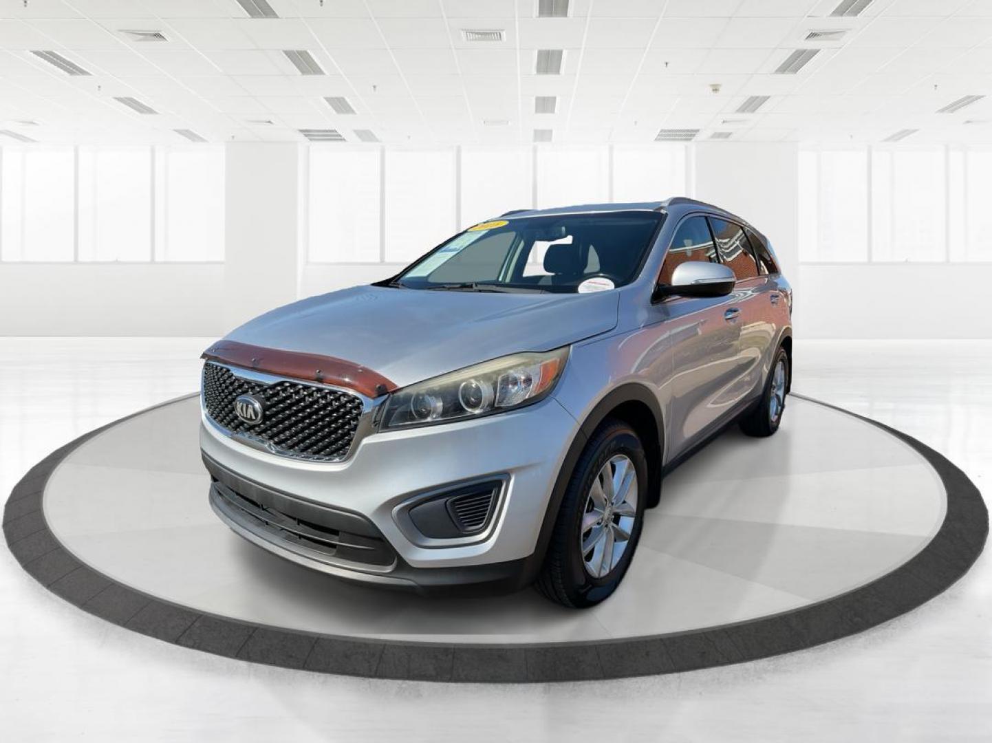 2016 Kia Sorento 2.4L LX (5XYPG4A34GG) with an 2.4L I-4 gasoline direct injection engine, located at 1230 East Main St, Xenia, OH, 45385, (937) 908-9800, 39.688026, -83.910172 - 2016 Kia Sorento 2.4L LX - Photo#7