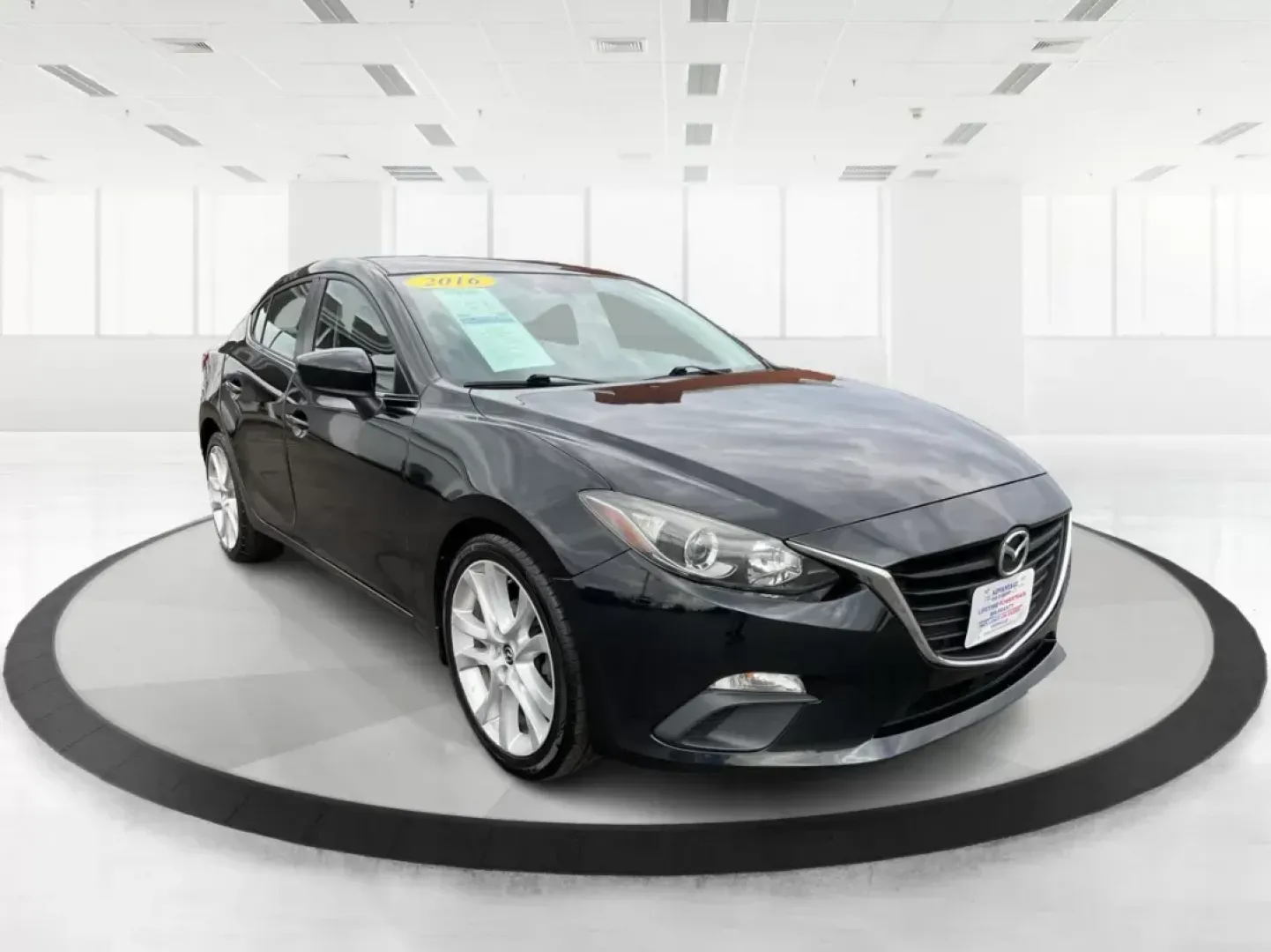 2016 Mazda MAZDA3 i Sport AT 4-Door (JM1BM1U74G1) with an 2.0L L4 DOHC 16V engine, 6-Speed Automatic transmission, located at 8750 N County Rd 25A, Piqua, OH, 45356, (937) 908-9800, 40.164391, -84.232513 - 2016 Mazda MAZDA3 i Sport AT 4-Door - Photo#0