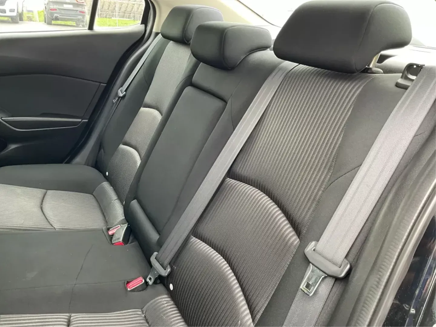 2016 Mazda MAZDA3 i Sport AT 4-Door (JM1BM1U74G1) with an 2.0L L4 DOHC 16V engine, 6-Speed Automatic transmission, located at 8750 N County Rd 25A, Piqua, OH, 45356, (937) 908-9800, 40.164391, -84.232513 - 2016 Mazda MAZDA3 i Sport AT 4-Door - Photo#9