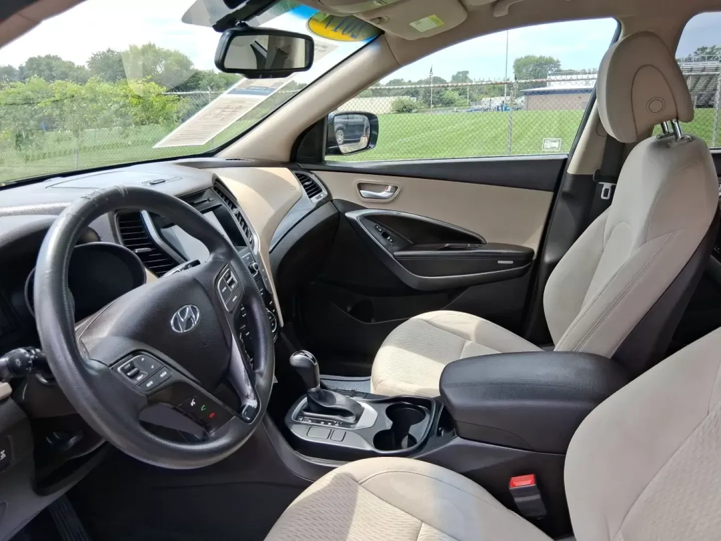 2017 Hyundai Santa Fe 2.4L (5XYZUDLB0HG) with an Theta II 2.4L I-4 gasoline direct injection engine, located at 1230 East Main St, Xenia, OH, 45385, (937) 908-9800, 39.688026, -83.910172 - **Embrace Adventure with the 2017 Hyundai Santa Fe at Advantage Car and Credit - Moraine!**<br /> <br /> Are you ready to elevate your lifestyle with a versatile vehicle that can keep up with your busy schedule? Look no further than the 2017 Hyundai Santa Fe, an SUV designed for those who love famil - Photo#9