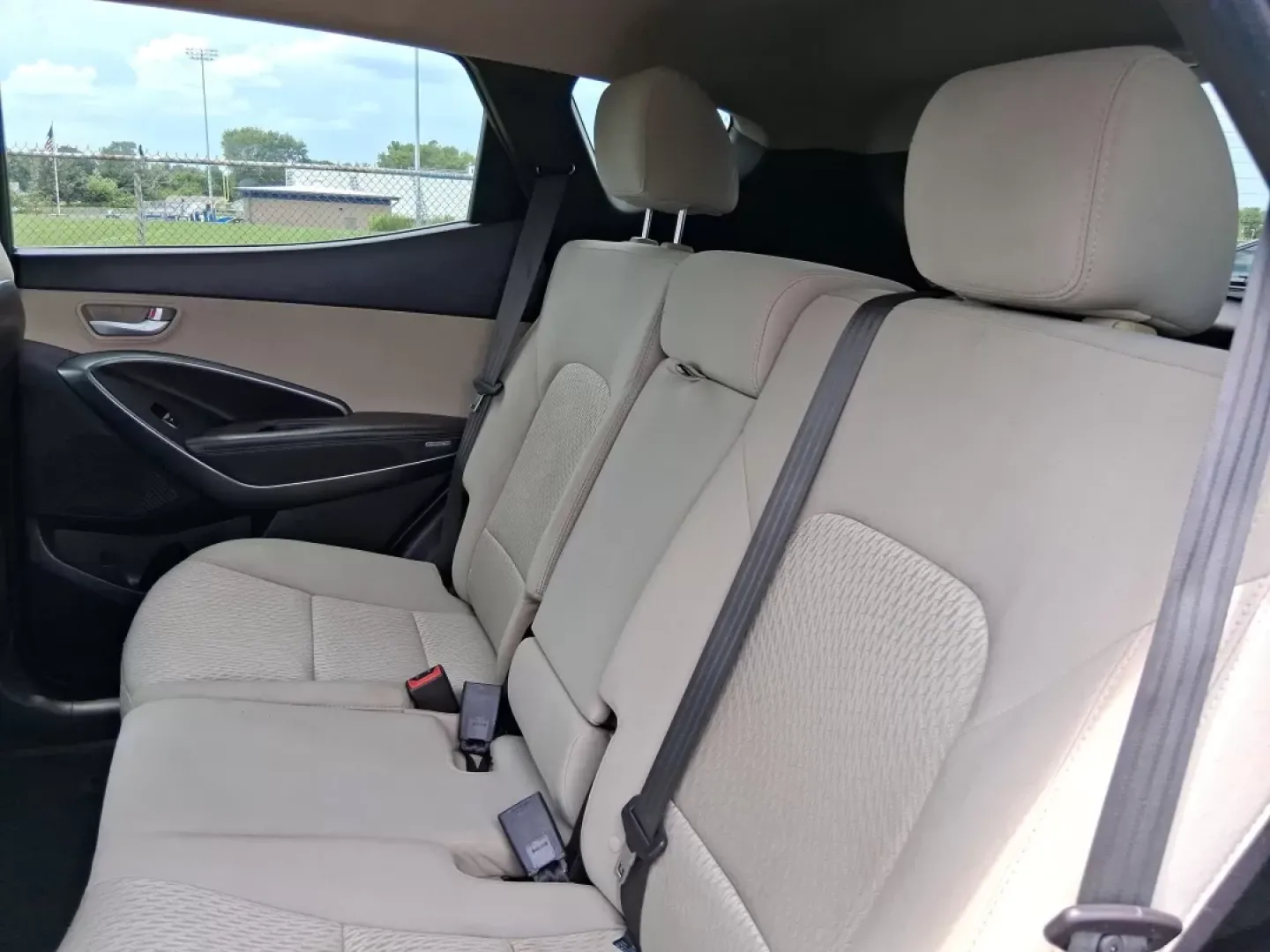2017 Hyundai Santa Fe 2.4L (5XYZUDLB0HG) with an Theta II 2.4L I-4 gasoline direct injection engine, located at 1230 East Main St, Xenia, OH, 45385, (937) 908-9800, 39.688026, -83.910172 - **Embrace Adventure with the 2017 Hyundai Santa Fe at Advantage Car and Credit - Moraine!**<br /> <br /> Are you ready to elevate your lifestyle with a versatile vehicle that can keep up with your busy schedule? Look no further than the 2017 Hyundai Santa Fe, an SUV designed for those who love famil - Photo#10