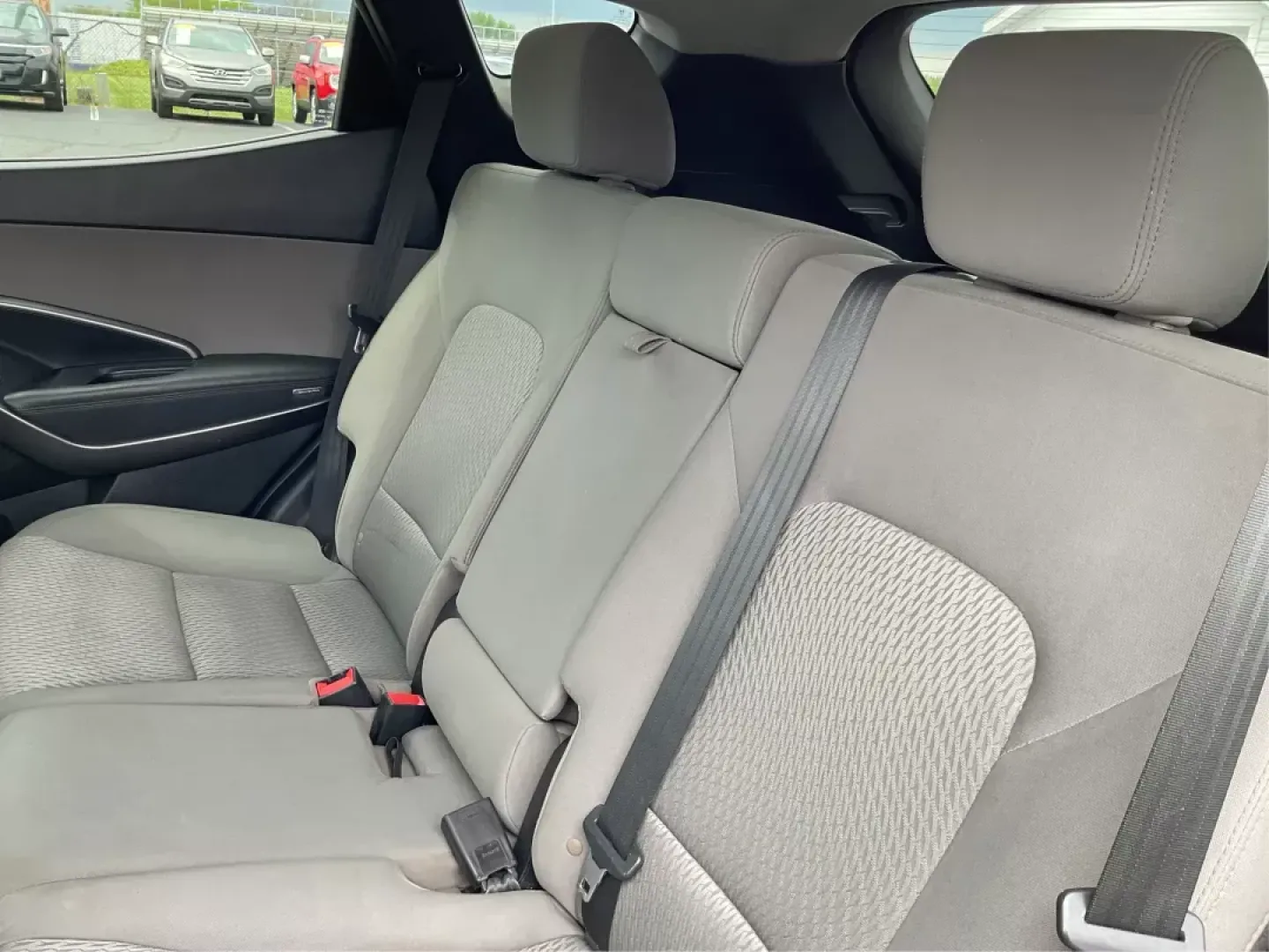 2017 Hyundai Santa Fe 2.4L (5NMZTDLB4HH) with an Theta II 2.4L I-4 gasoline direct injection engine, located at 1951 S Dayton Lakeview Rd., New Carlisle, OH, 45344, (937) 908-9800, 39.890999, -84.050255 - **Discover Your Next Adventure with the 2017 Hyundai Santa Fe Sport at Advantage Car and Credit!**<br /> <br /> Are you ready to elevate your lifestyle and embrace the adventures waiting for you? Whether you're a growing family in need of space, a daily commuter looking for comfort, or an outdoor en - Photo#9