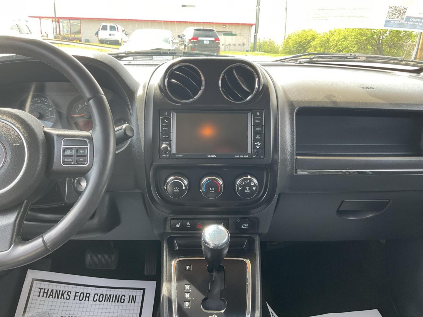2017 Jeep Patriot High Altitude 4x4 (1C4NJRFB8HD) with an 2.4L I-4 DOHC engine, located at 880 E. National Road, Vandalia, OH, 45377, (937) 908-9800, 39.891918, -84.183594 - 2017 Jeep Patriot High Altitude 4x4 - Photo#11