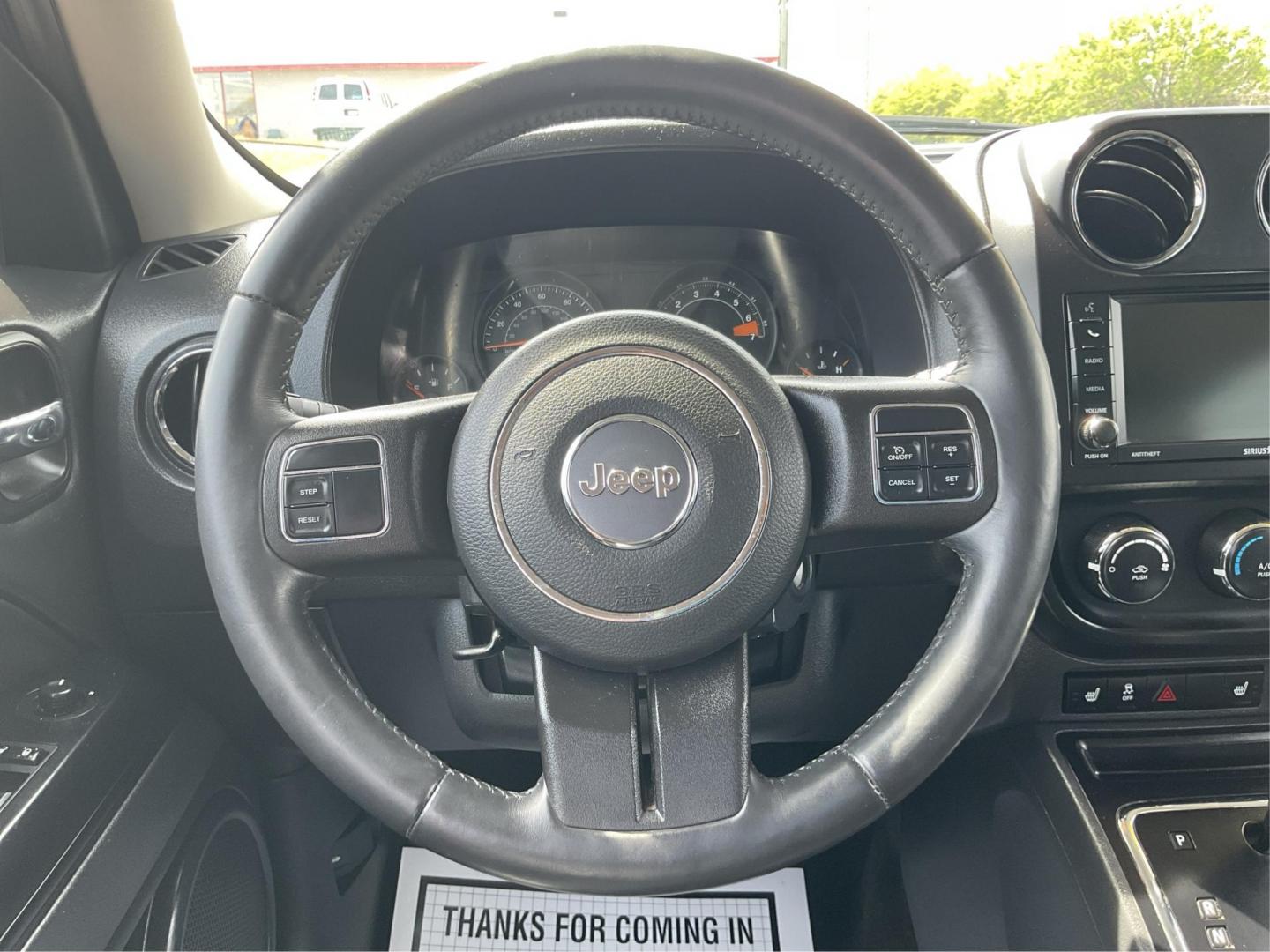 2017 Jeep Patriot High Altitude 4x4 (1C4NJRFB8HD) with an 2.4L I-4 DOHC engine, located at 880 E. National Road, Vandalia, OH, 45377, (937) 908-9800, 39.891918, -84.183594 - 2017 Jeep Patriot High Altitude 4x4 - Photo#14
