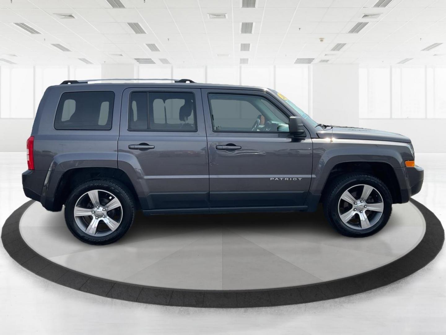 2017 Jeep Patriot High Altitude 4x4 (1C4NJRFB8HD) with an 2.4L I-4 DOHC engine, located at 880 E. National Road, Vandalia, OH, 45377, (937) 908-9800, 39.891918, -84.183594 - 2017 Jeep Patriot High Altitude 4x4 - Photo#1