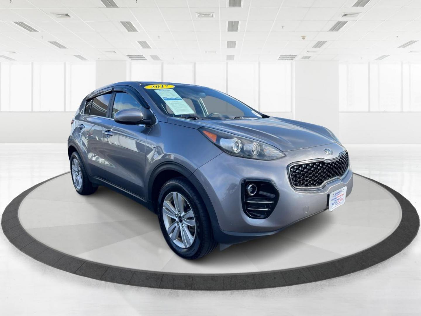 2017 Kia Sportage LX AWD (KNDPMCAC1H7) with an 2.4L V6 DOHC 24V engine, 6-Speed Automatic transmission, located at 8750 N County Rd 25A, Piqua, OH, 45356, (937) 908-9800, 40.164391, -84.232513 - 2017 Kia Sportage LX AWD - Photo#0