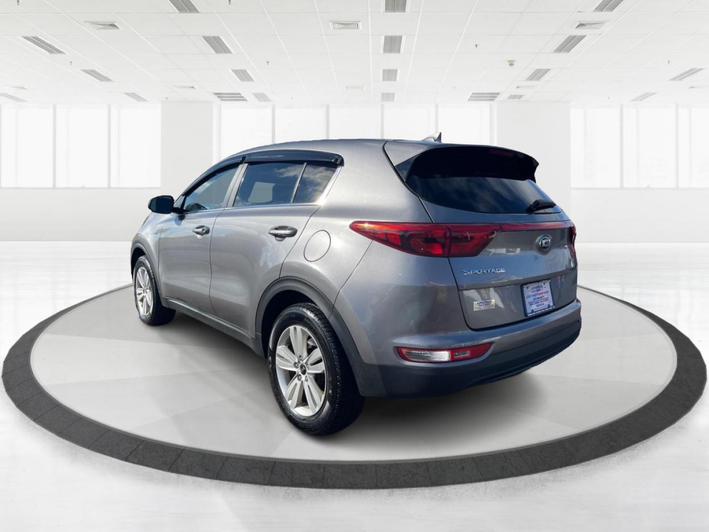 2017 Kia Sportage LX AWD (KNDPMCAC1H7) with an 2.4L V6 DOHC 24V engine, 6-Speed Automatic transmission, located at 8750 N County Rd 25A, Piqua, OH, 45356, (937) 908-9800, 40.164391, -84.232513 - 2017 Kia Sportage LX AWD - Photo#4