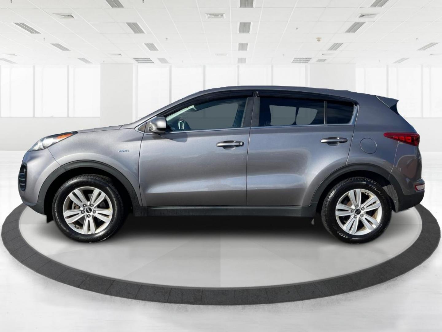 2017 Kia Sportage LX AWD (KNDPMCAC1H7) with an 2.4L V6 DOHC 24V engine, 6-Speed Automatic transmission, located at 8750 N County Rd 25A, Piqua, OH, 45356, (937) 908-9800, 40.164391, -84.232513 - 2017 Kia Sportage LX AWD - Photo#5