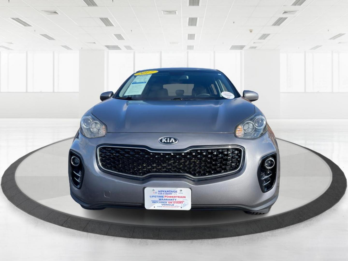 2017 Kia Sportage LX AWD (KNDPMCAC1H7) with an 2.4L V6 DOHC 24V engine, 6-Speed Automatic transmission, located at 8750 N County Rd 25A, Piqua, OH, 45356, (937) 908-9800, 40.164391, -84.232513 - 2017 Kia Sportage LX AWD - Photo#6