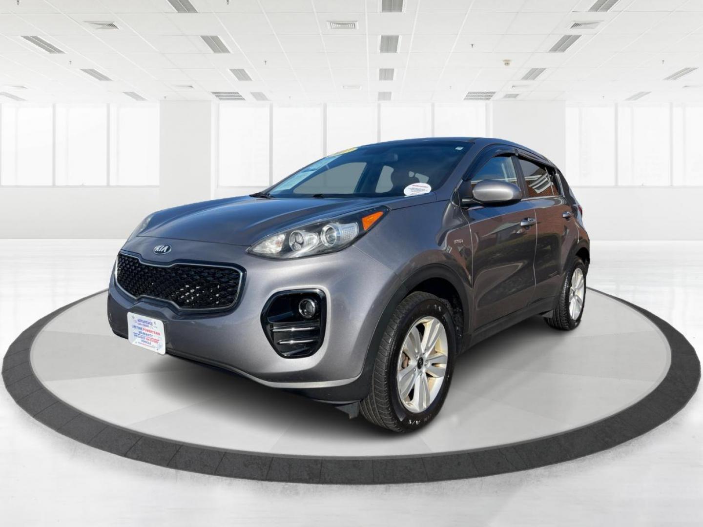 2017 Kia Sportage LX AWD (KNDPMCAC1H7) with an 2.4L V6 DOHC 24V engine, 6-Speed Automatic transmission, located at 8750 N County Rd 25A, Piqua, OH, 45356, (937) 908-9800, 40.164391, -84.232513 - 2017 Kia Sportage LX AWD - Photo#7