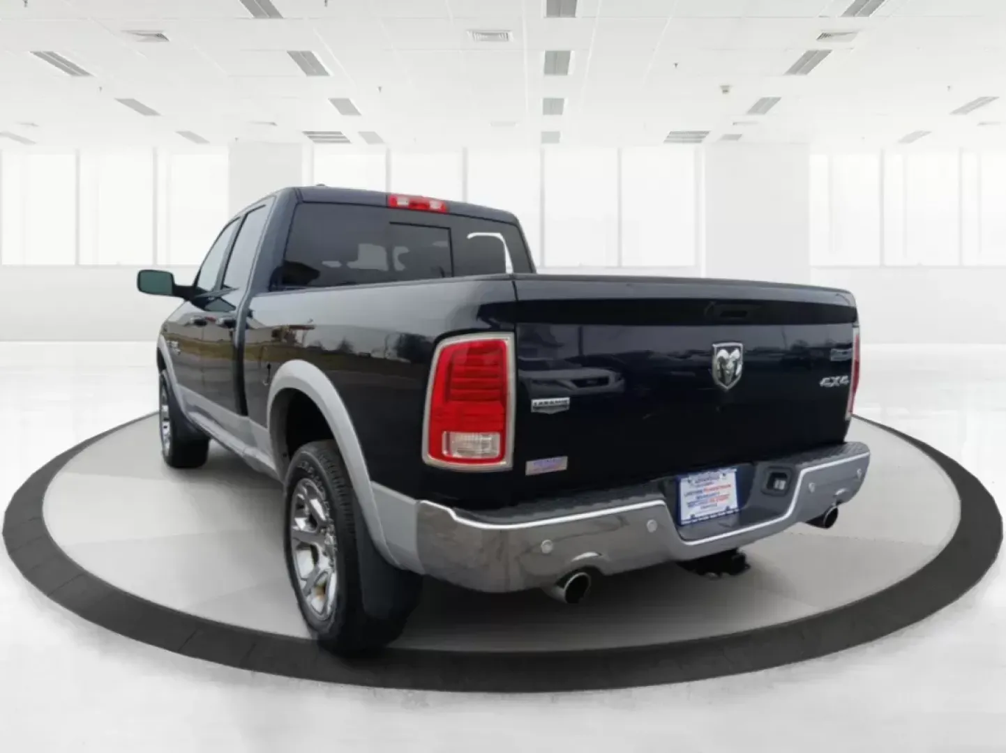 2017 Ram 1500 Laramie Quad Cab 4WD (1C6RR7JT1HS) with an 5.7L V8 OHV 16V engine, 8-Speed Automatic transmission, located at 1184 Kauffman Ave, Fairborn, OH, 45324, (937) 908-9800, 39.807072, -84.030914 - 2017 Ram 1500 Laramie Quad Cab 4WD - Photo#5
