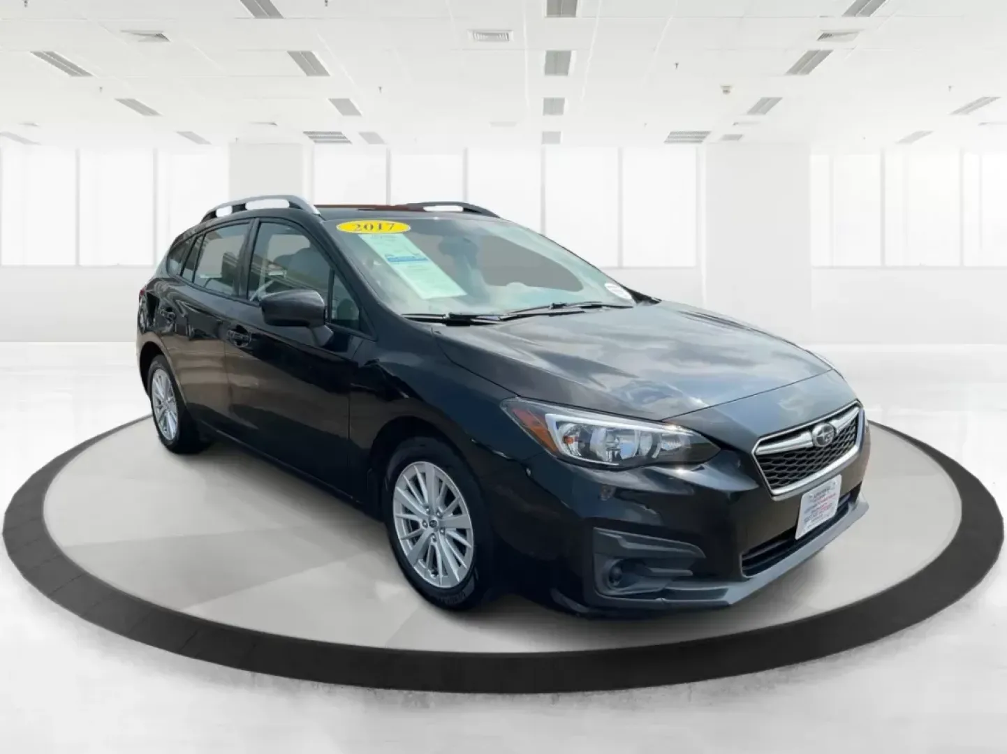 2017 Subaru Impreza 2.0i Premium (4S3GTAB63H3) with an 2L H-4 gasoline direct injection engine, located at 1951 S Dayton Lakeview Rd., New Carlisle, OH, 45344, (937) 908-9800, 39.890999, -84.050255 - Are you in search of the perfect vehicle for your growing family or perhaps an adventure-ready hatchback that can easily navigate through city streets and weekend getaways? Look no further than this 2017 Subaru Impreza 2.0i Premium, available now at Advantage Car and Credit. Nestled in the heart of - Photo#0