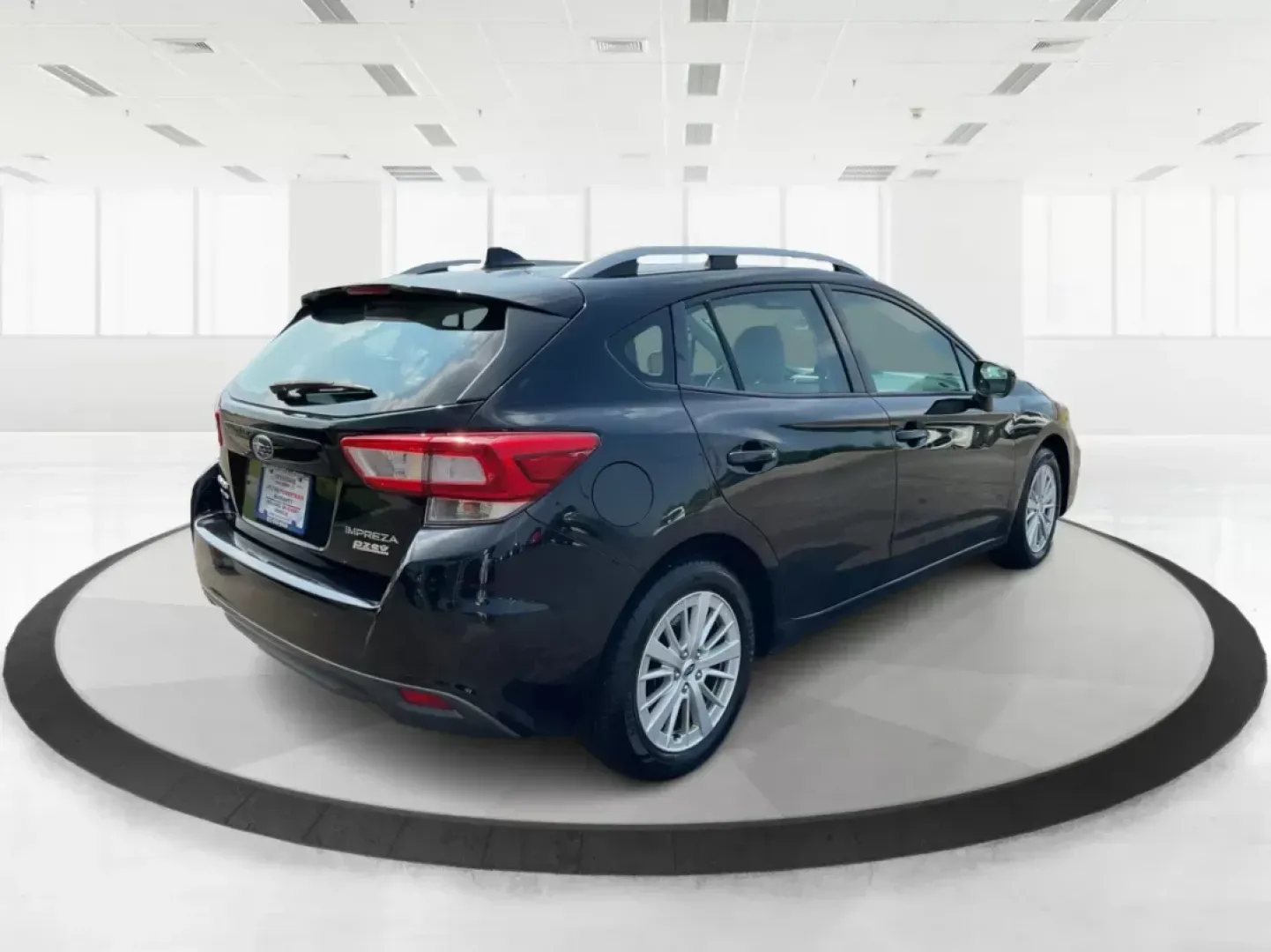 2017 Subaru Impreza 2.0i Premium (4S3GTAB63H3) with an 2L H-4 gasoline direct injection engine, located at 1951 S Dayton Lakeview Rd., New Carlisle, OH, 45344, (937) 908-9800, 39.890999, -84.050255 - Are you in search of the perfect vehicle for your growing family or perhaps an adventure-ready hatchback that can easily navigate through city streets and weekend getaways? Look no further than this 2017 Subaru Impreza 2.0i Premium, available now at Advantage Car and Credit. Nestled in the heart of - Photo#2