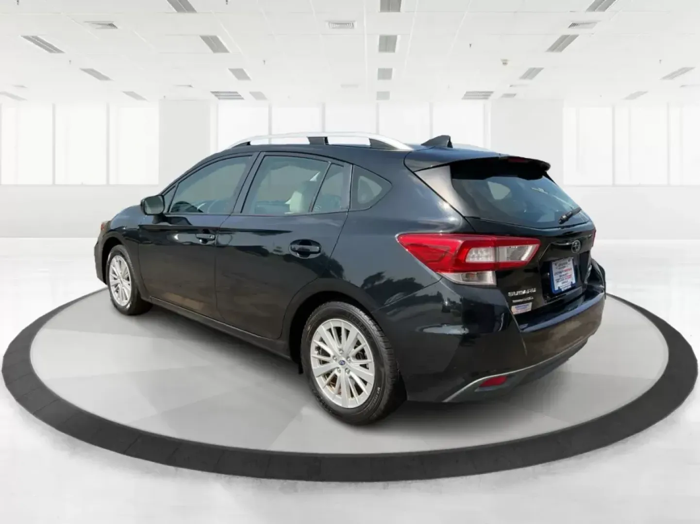 2017 Subaru Impreza 2.0i Premium (4S3GTAB63H3) with an 2L H-4 gasoline direct injection engine, located at 1951 S Dayton Lakeview Rd., New Carlisle, OH, 45344, (937) 908-9800, 39.890999, -84.050255 - Are you in search of the perfect vehicle for your growing family or perhaps an adventure-ready hatchback that can easily navigate through city streets and weekend getaways? Look no further than this 2017 Subaru Impreza 2.0i Premium, available now at Advantage Car and Credit. Nestled in the heart of - Photo#4