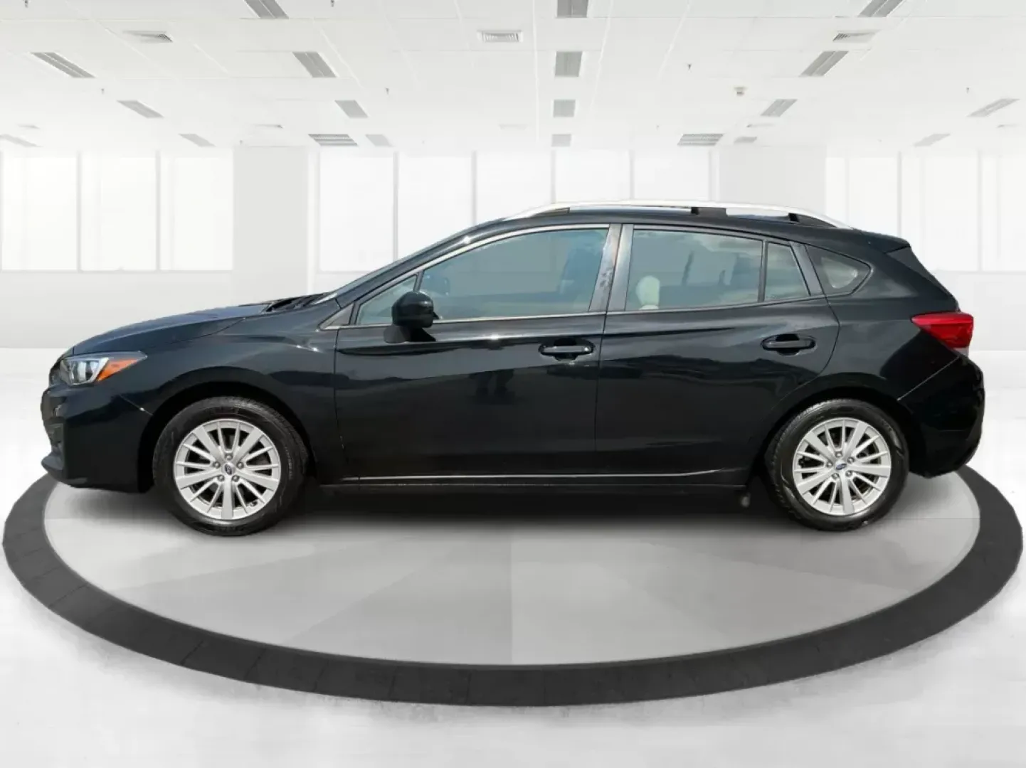 2017 Subaru Impreza 2.0i Premium (4S3GTAB63H3) with an 2L H-4 gasoline direct injection engine, located at 1951 S Dayton Lakeview Rd., New Carlisle, OH, 45344, (937) 908-9800, 39.890999, -84.050255 - Are you in search of the perfect vehicle for your growing family or perhaps an adventure-ready hatchback that can easily navigate through city streets and weekend getaways? Look no further than this 2017 Subaru Impreza 2.0i Premium, available now at Advantage Car and Credit. Nestled in the heart of - Photo#5
