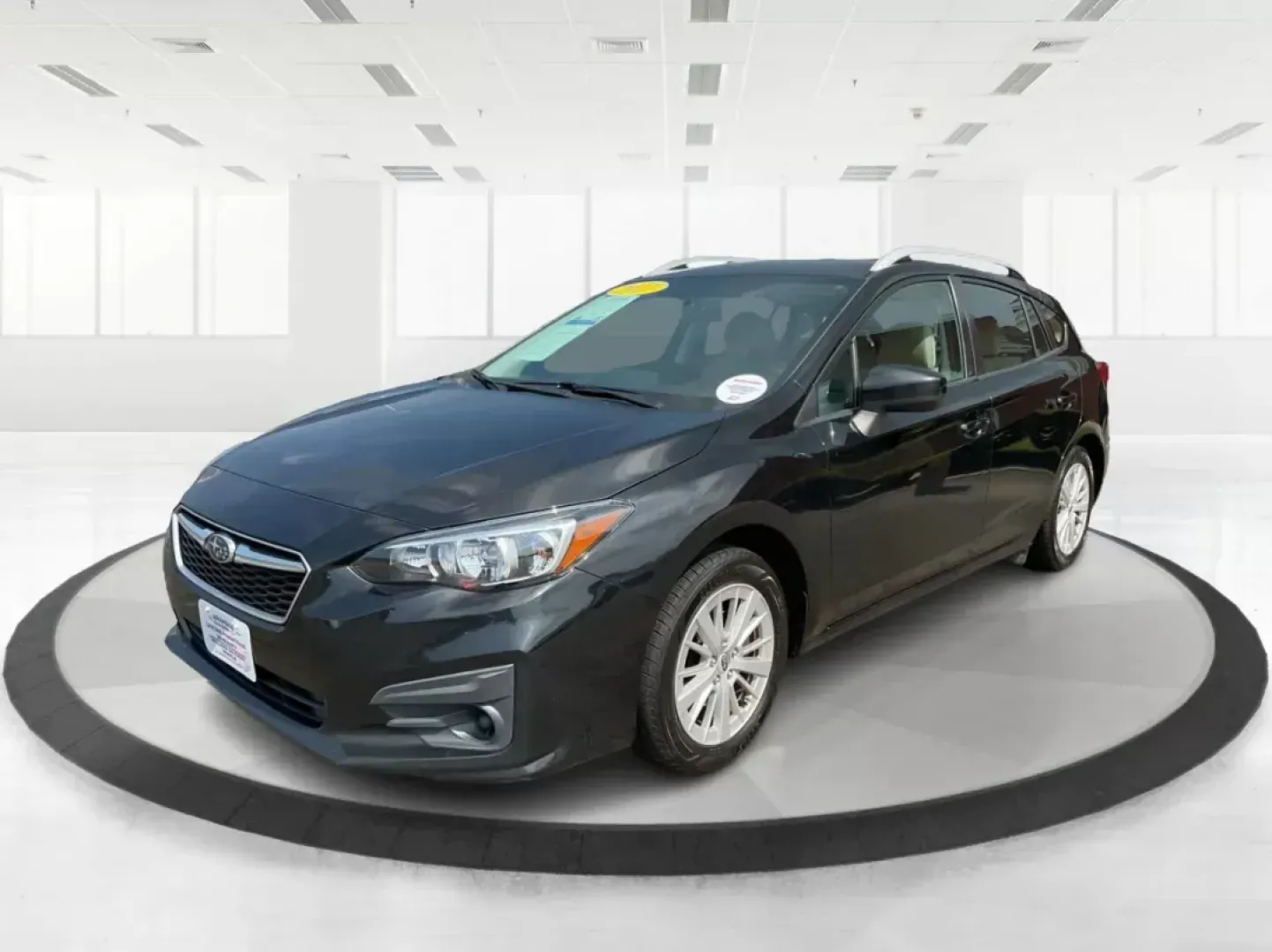 2017 Subaru Impreza 2.0i Premium (4S3GTAB63H3) with an 2L H-4 gasoline direct injection engine, located at 1951 S Dayton Lakeview Rd., New Carlisle, OH, 45344, (937) 908-9800, 39.890999, -84.050255 - Are you in search of the perfect vehicle for your growing family or perhaps an adventure-ready hatchback that can easily navigate through city streets and weekend getaways? Look no further than this 2017 Subaru Impreza 2.0i Premium, available now at Advantage Car and Credit. Nestled in the heart of - Photo#7