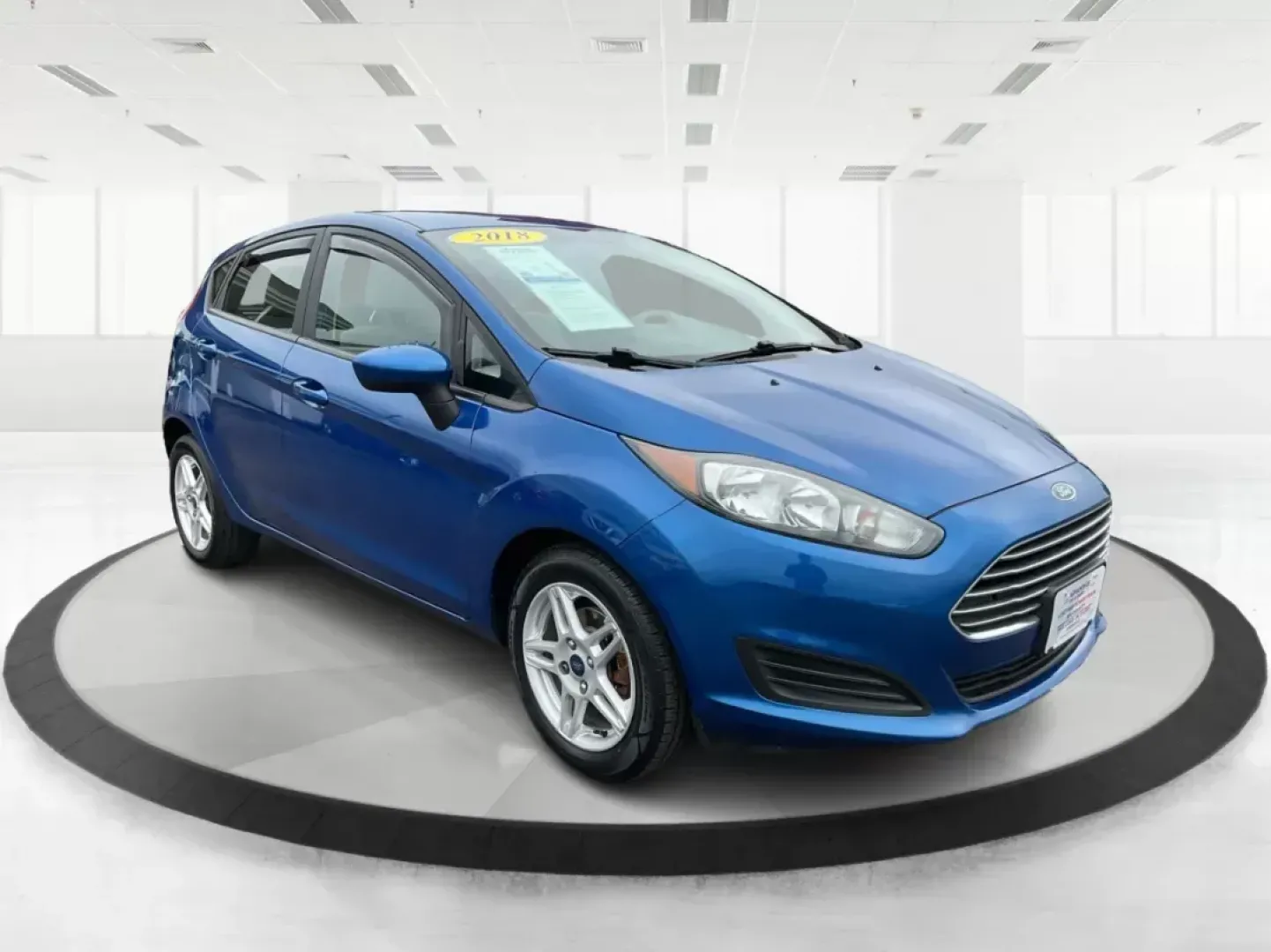 2018 Ford Fiesta SE (3FADP4EJ2JM) with an 1.6L I-4 DOHC engine, located at 8750 N County Rd 25A, Piqua, OH, 45356, (937) 908-9800, 40.164391, -84.232513 - 2018 Ford Fiesta SE - Photo#0