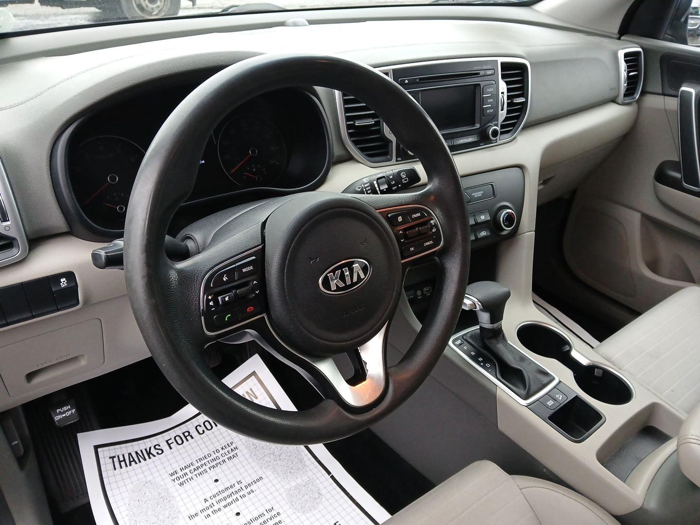 2018 Kia Sportage LX FWD (KNDPM3AC3J7) with an 2.4L V6 DOHC 24V engine, 6-Speed Automatic transmission, located at 4508 South Dixie Dr, Moraine, OH, 45439, (937) 908-9800, 39.689976, -84.218452 - 2018 Kia Sportage LX FWD - Photo#8