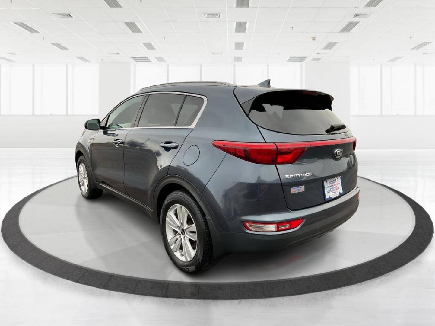 2019 Kia Sportage LX (KNDPMCAC2K7) with an Theta II 2.4L I-4 gasoline direct injection engine, located at 880 E. National Road, Vandalia, OH, 45377, (937) 908-9800, 39.891918, -84.183594 - 2019 Kia Sportage LX - Photo#4