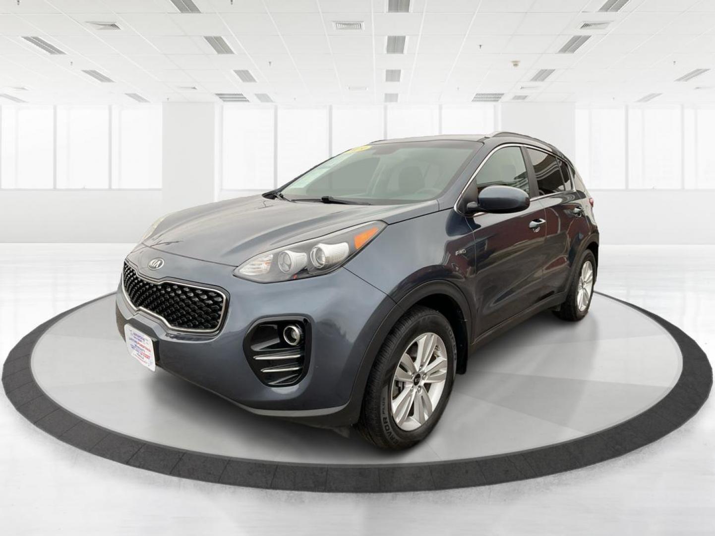2019 Kia Sportage LX (KNDPMCAC2K7) with an Theta II 2.4L I-4 gasoline direct injection engine, located at 880 E. National Road, Vandalia, OH, 45377, (937) 908-9800, 39.891918, -84.183594 - 2019 Kia Sportage LX - Photo#7