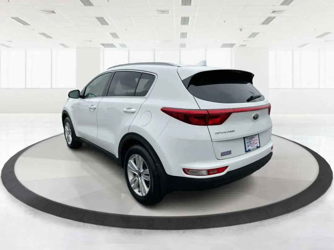 2018 Kia Sportage LX (KNDPMCACXJ7) with an Theta II 2.4L I-4 gasoline direct injection engine, located at 1099 N County Rd 25A , Troy, OH, 45373, (937) 908-9800, 40.057079, -84.212883 - 2018 Kia Sportage LX - Photo#3