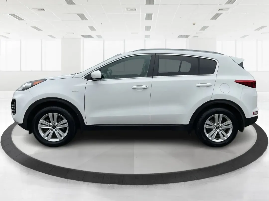2018 Kia Sportage LX (KNDPMCACXJ7) with an Theta II 2.4L I-4 gasoline direct injection engine, located at 1099 N County Rd 25A , Troy, OH, 45373, (937) 908-9800, 40.057079, -84.212883 - 2018 Kia Sportage LX - Photo#4