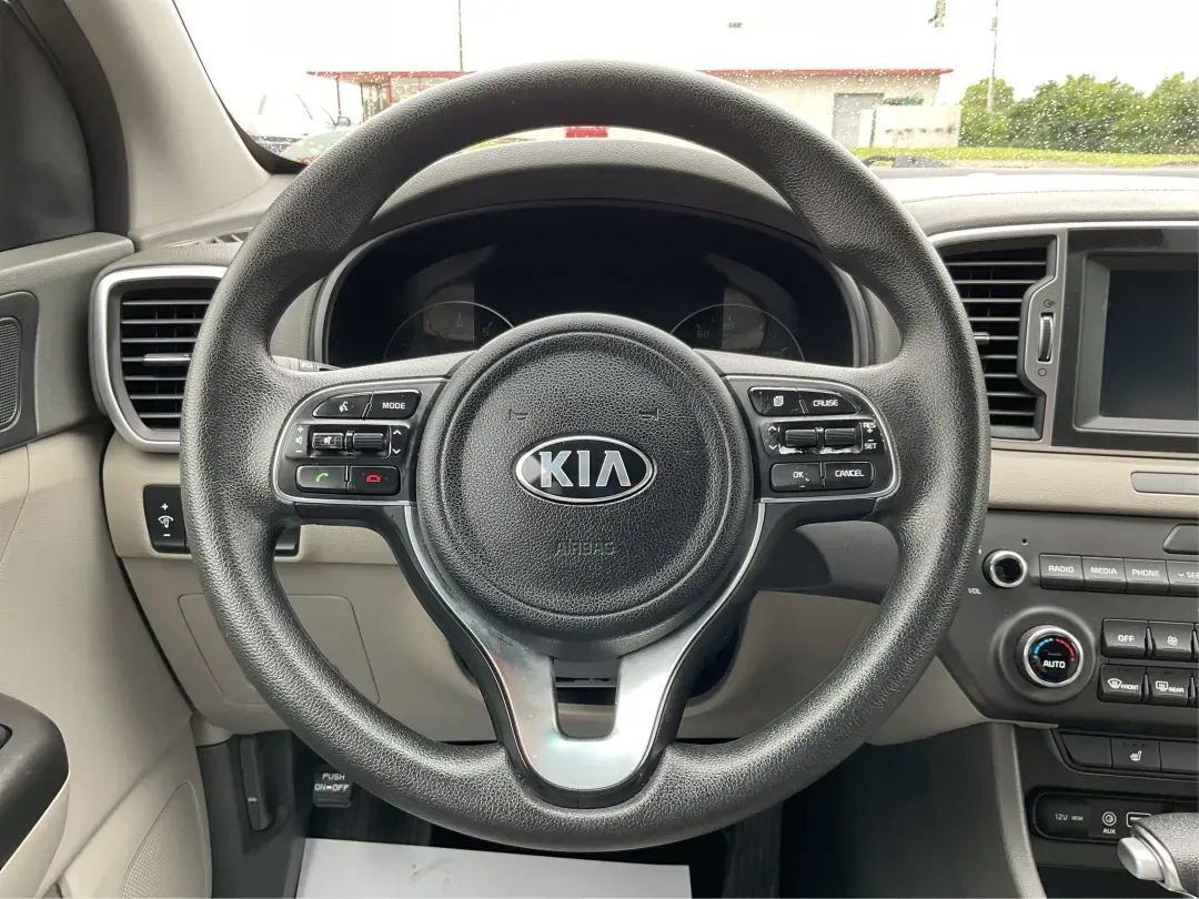 2018 Kia Sportage LX (KNDPMCACXJ7) with an Theta II 2.4L I-4 gasoline direct injection engine, located at 1099 N County Rd 25A , Troy, OH, 45373, (937) 908-9800, 40.057079, -84.212883 - 2018 Kia Sportage LX - Photo#15