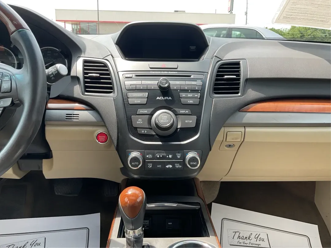 2014 Acura RDX Base (5J8TB3H39EL) with an Other engine, located at 880 E. National Road, Vandalia, OH, 45377, (937) 908-9800, 39.891918, -84.183594 - Unleash the perfect blend of comfort and versatility with the 2014 Acura RDX, a crossover that caters to both your daily grind and weekend adventures. Whether you're a growing family seeking spaciousness, a commuter looking for reliability, or a weekend warrior ready for road trips, this vehicle has - Photo#13