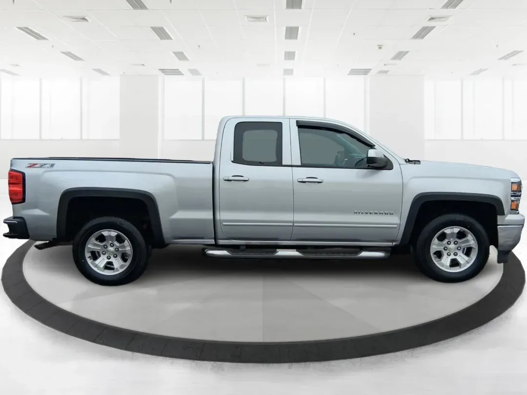 2015 Silver Chevrolet Silverado 1500 LT Double Cab 4WD (1GCVKREC6FZ) with an 5.3L V8 OHV 16V engine, 6-Speed Automatic transmission, located at 1951 S Dayton Lakeview Rd., New Carlisle, OH, 45344, (937) 908-9800, 39.890999, -84.050255 - Picture your next weekend: you've got a project list to tackle, a trailer to hook up, and a quick escape planned after work-maybe a run out toward Springfield or a backroad cruise near the Mad River. If you need a truck that fits real life in Clark County, this **2015 Chevrolet Silverado 1500 LT Dou - Photo#1